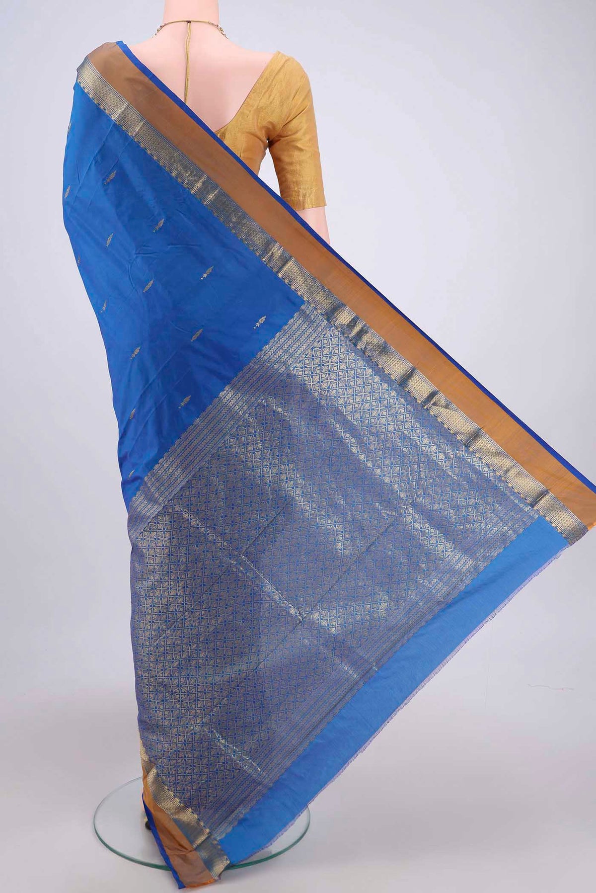 Flat view of Royal Blue Blended Bangalore Silk Saree with Zari Butta on the body and Zari Border. 