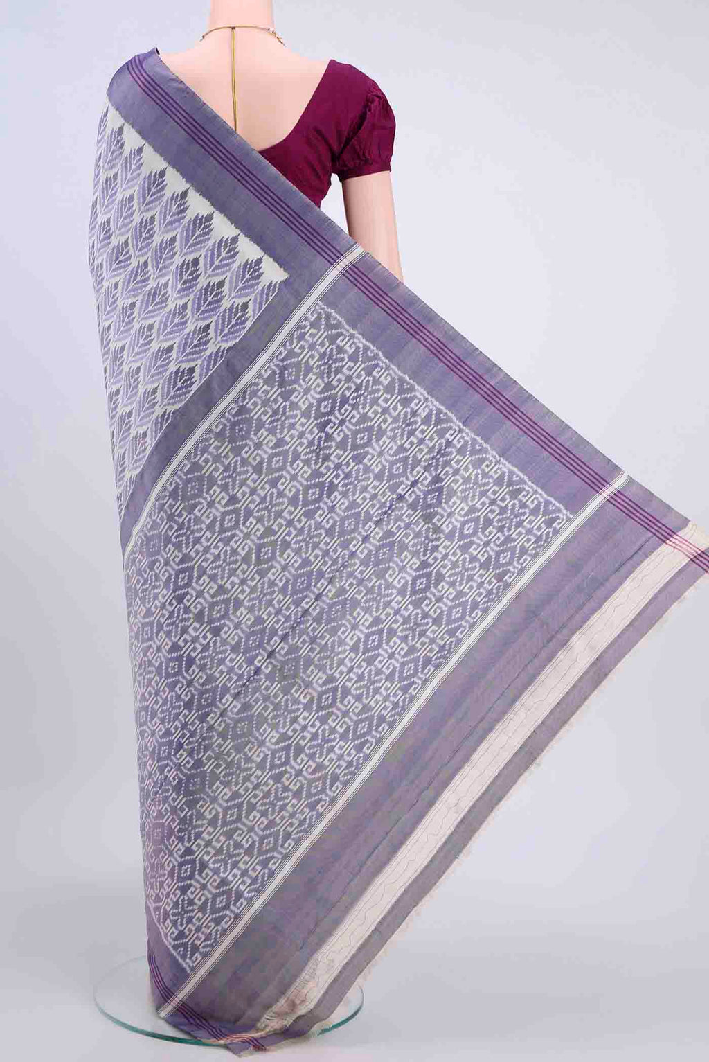 Flat view of Off White Pochampally Silk Saree with Pure Ikat on the body and Plain Border