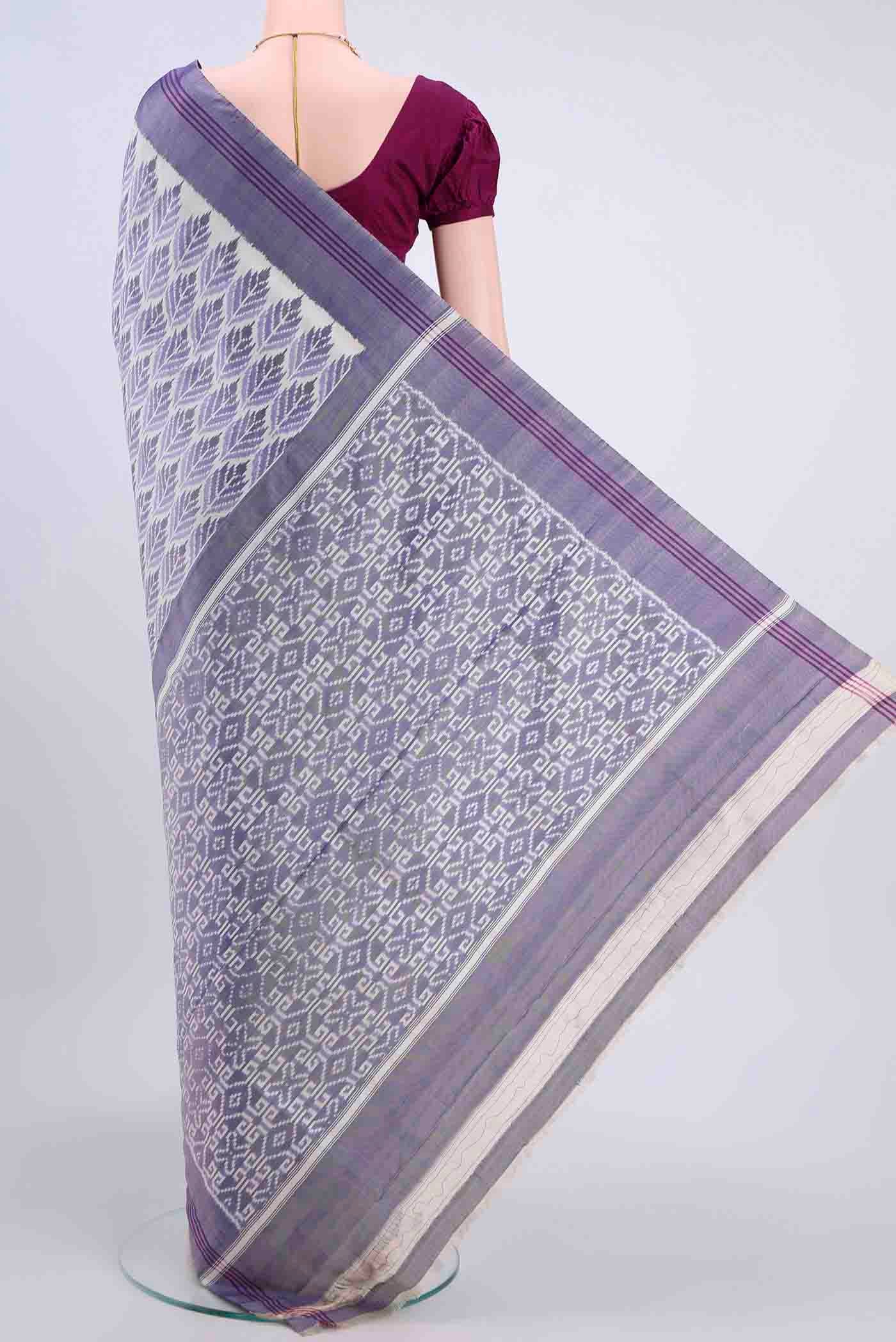 Flat view of Off White Pochampally Silk Saree with Pure Ikat on the body and Plain Border