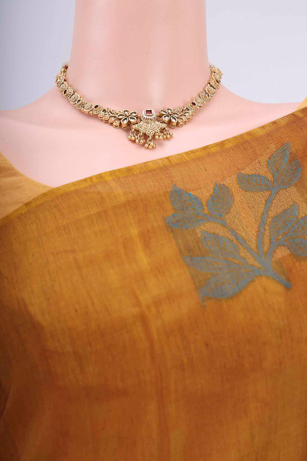 Border image of Mustard Kora Cotton Saree with Zari Butta on the body and Zari Border. 