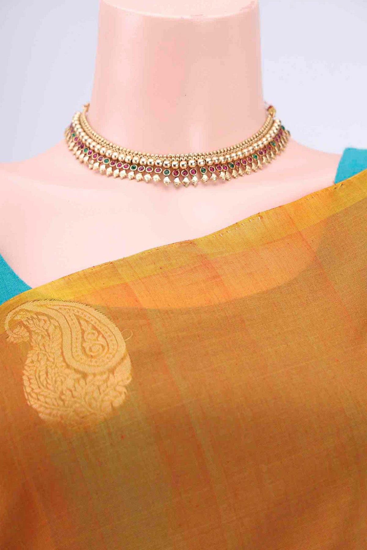 Border image of Mustard Kora Cotton Saree with Zari Butta on the body and Zari Border. 