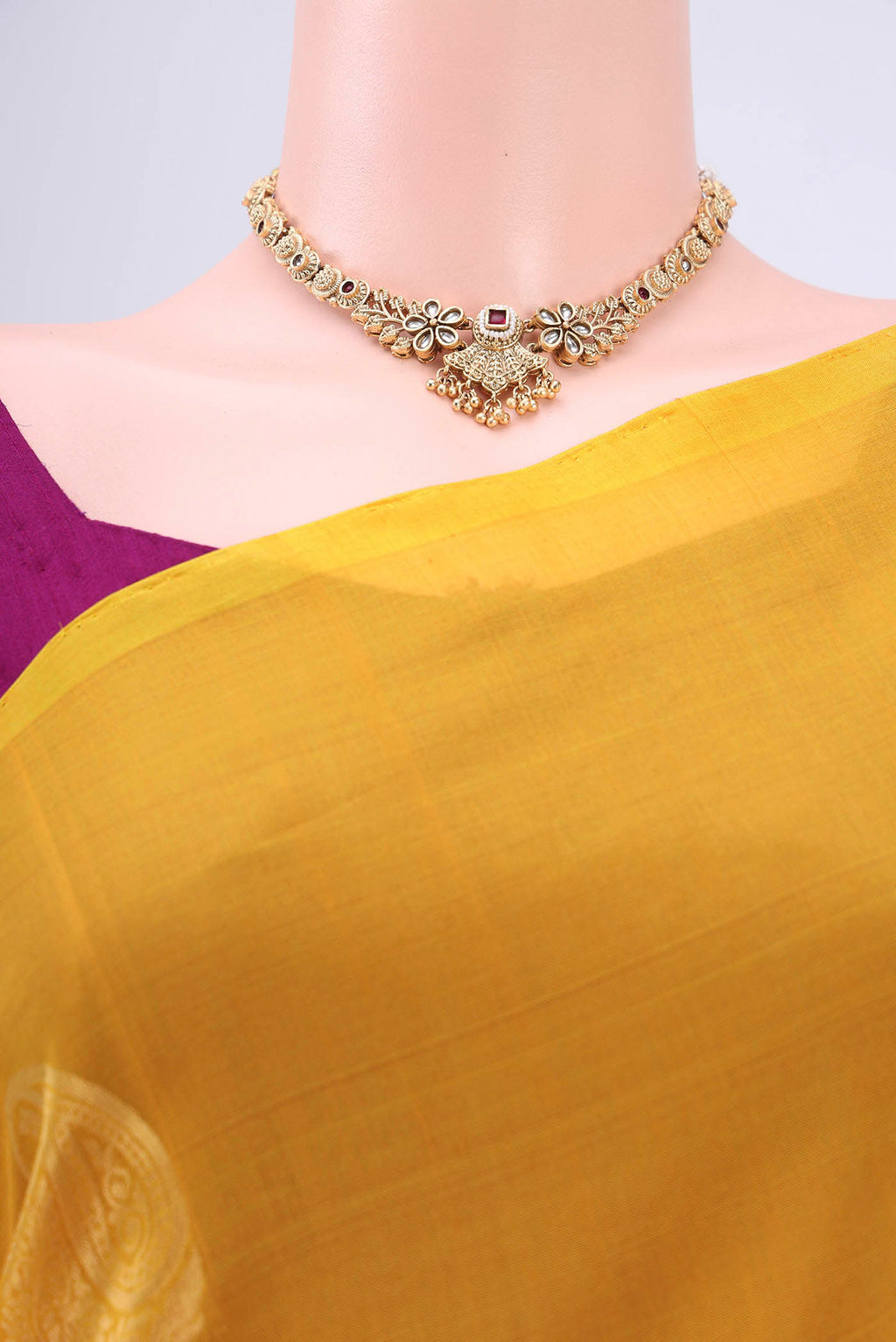 Border image of Yellow Kora Cotton Saree with Zari Butta on the body and Zari Border. 