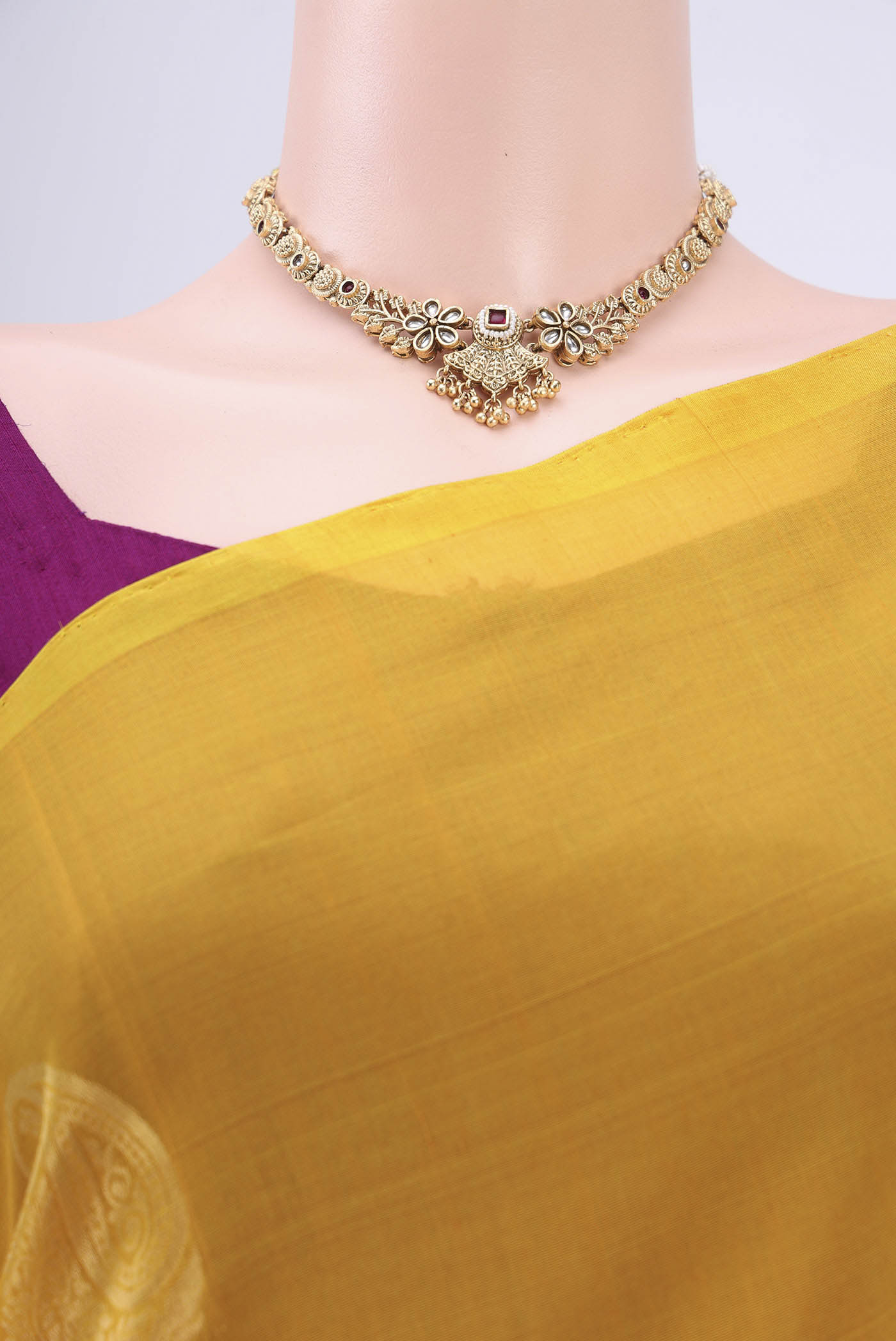Border image of Yellow Kora Cotton Saree with Zari Butta on the body and Zari Border. 