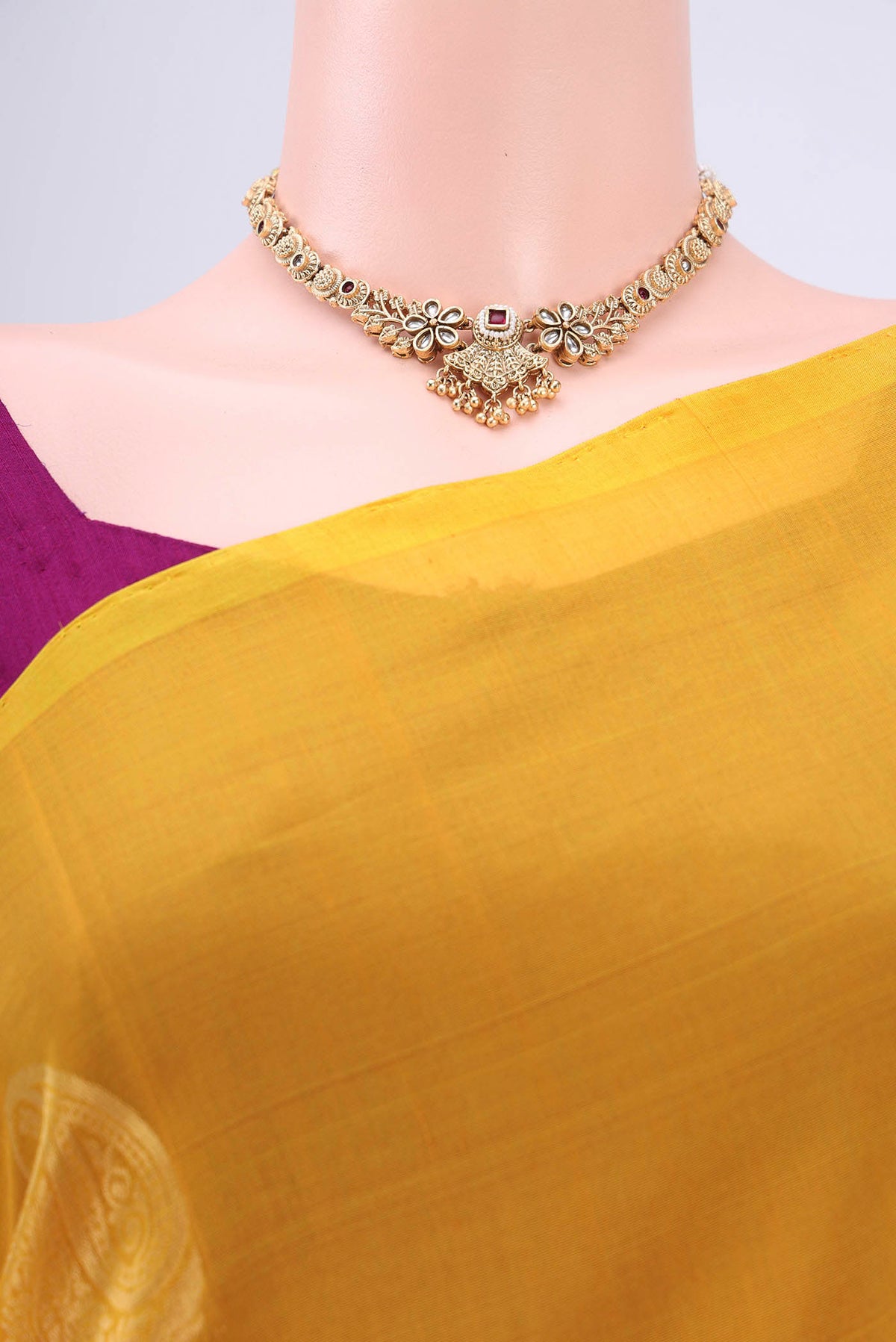 Border image of Yellow Kora Cotton Saree with Zari Butta on the body and Zari Border. 