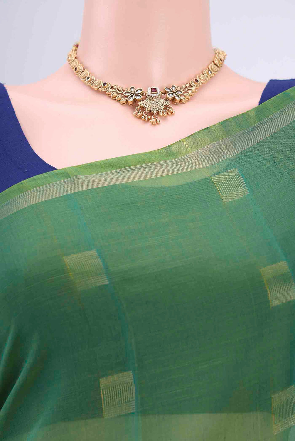 Border image of Green Kora Cotton Saree with Zari Butta on the body and Zari Border. 