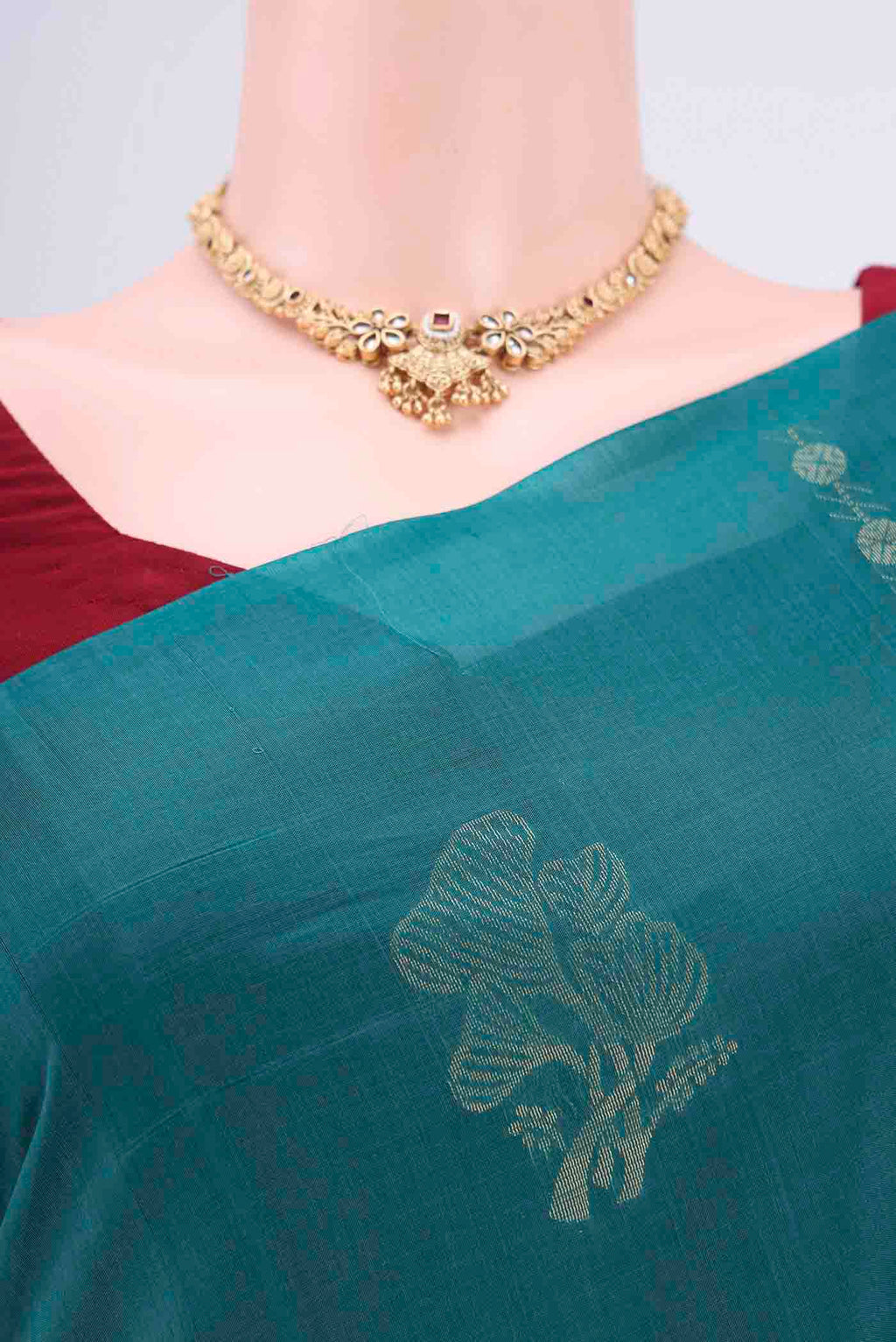 Border image of Sea Green Kora Cotton Saree with Zari Butta on the body and Zari Border. 