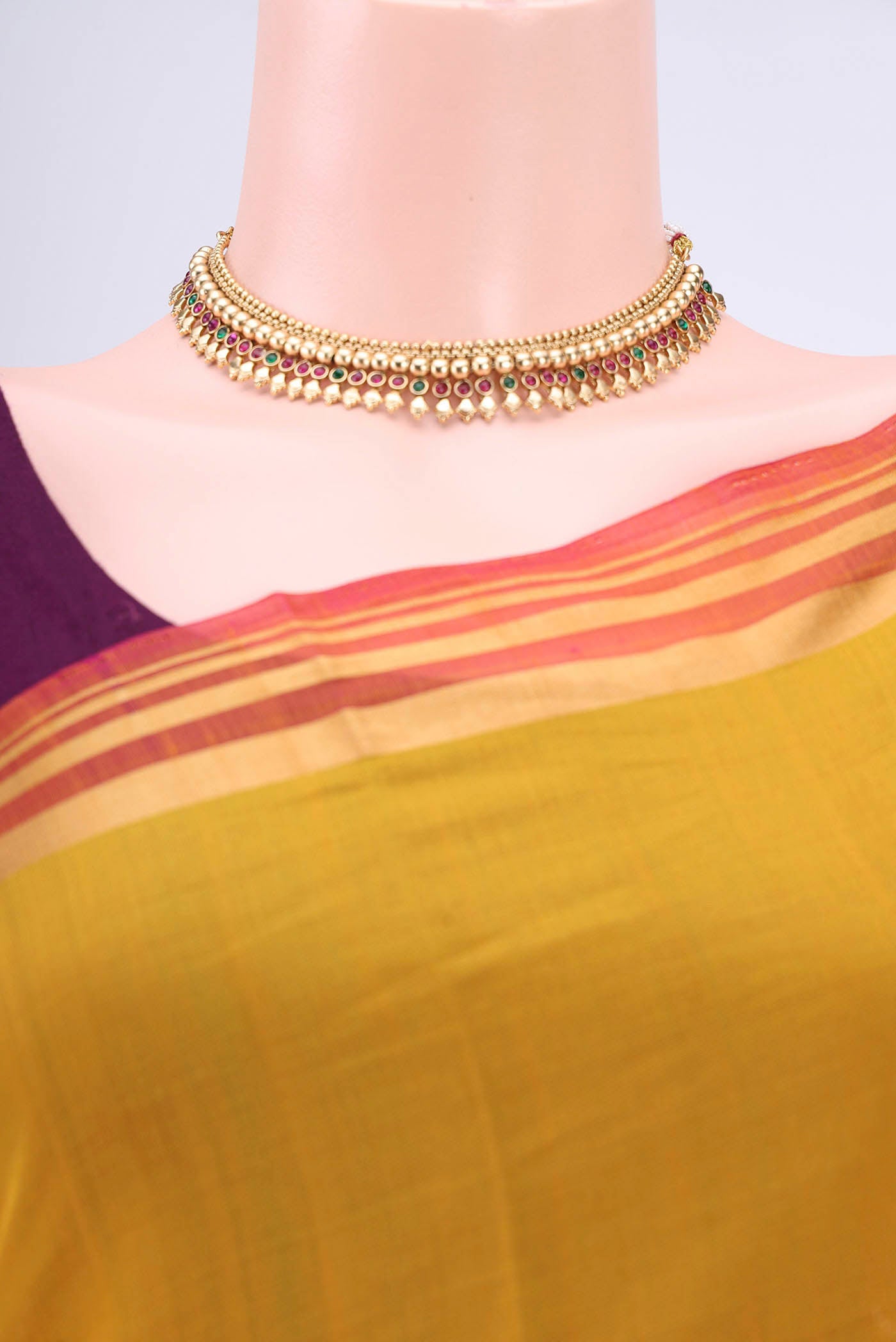 Border image of Yellow Kora Cotton Saree with Zari Butta on the body and Zari Border. 