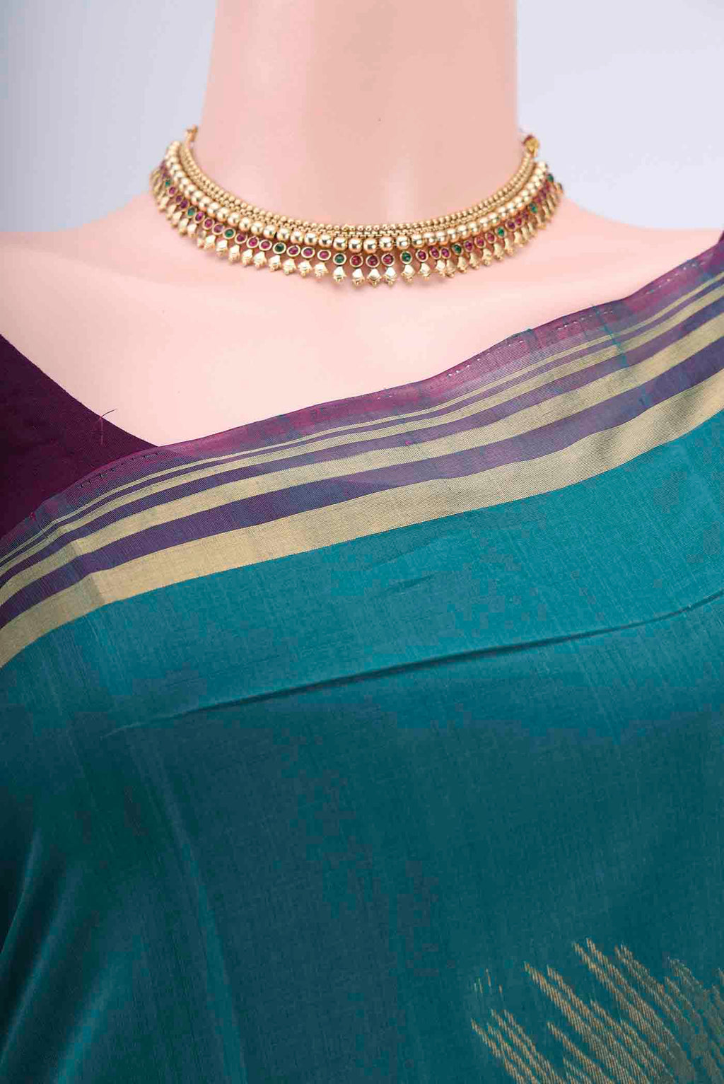 Border image of Sea Green Kora Cotton Saree with Zari Butta on the body and Zari Border. 