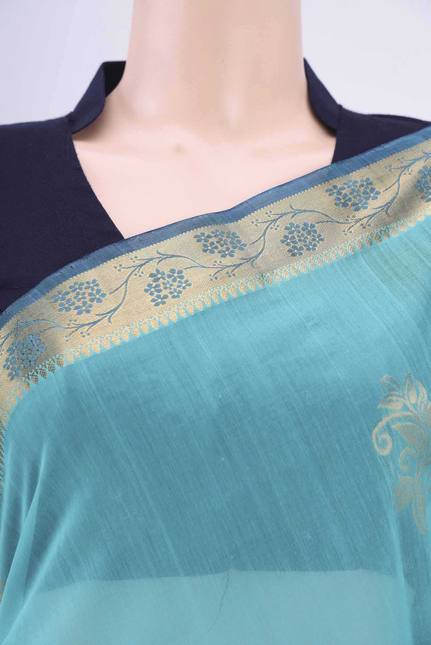Border image of Turquoise Silk Cotton Saree with Zari Butta on the body and Zari Border. 