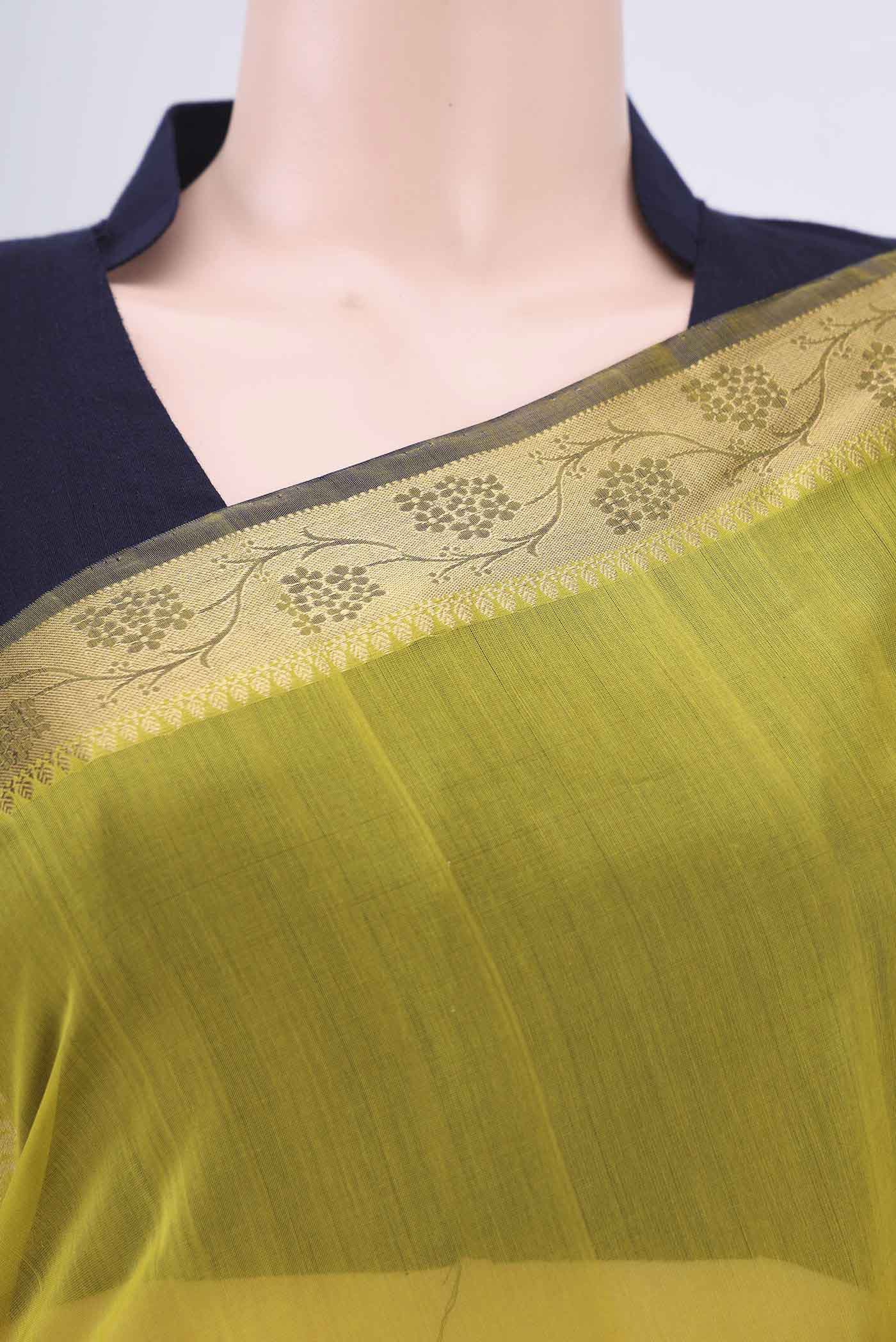 Border image of Acid Green Silk Cotton Saree with Zari Butta on the body and Zari Border. 