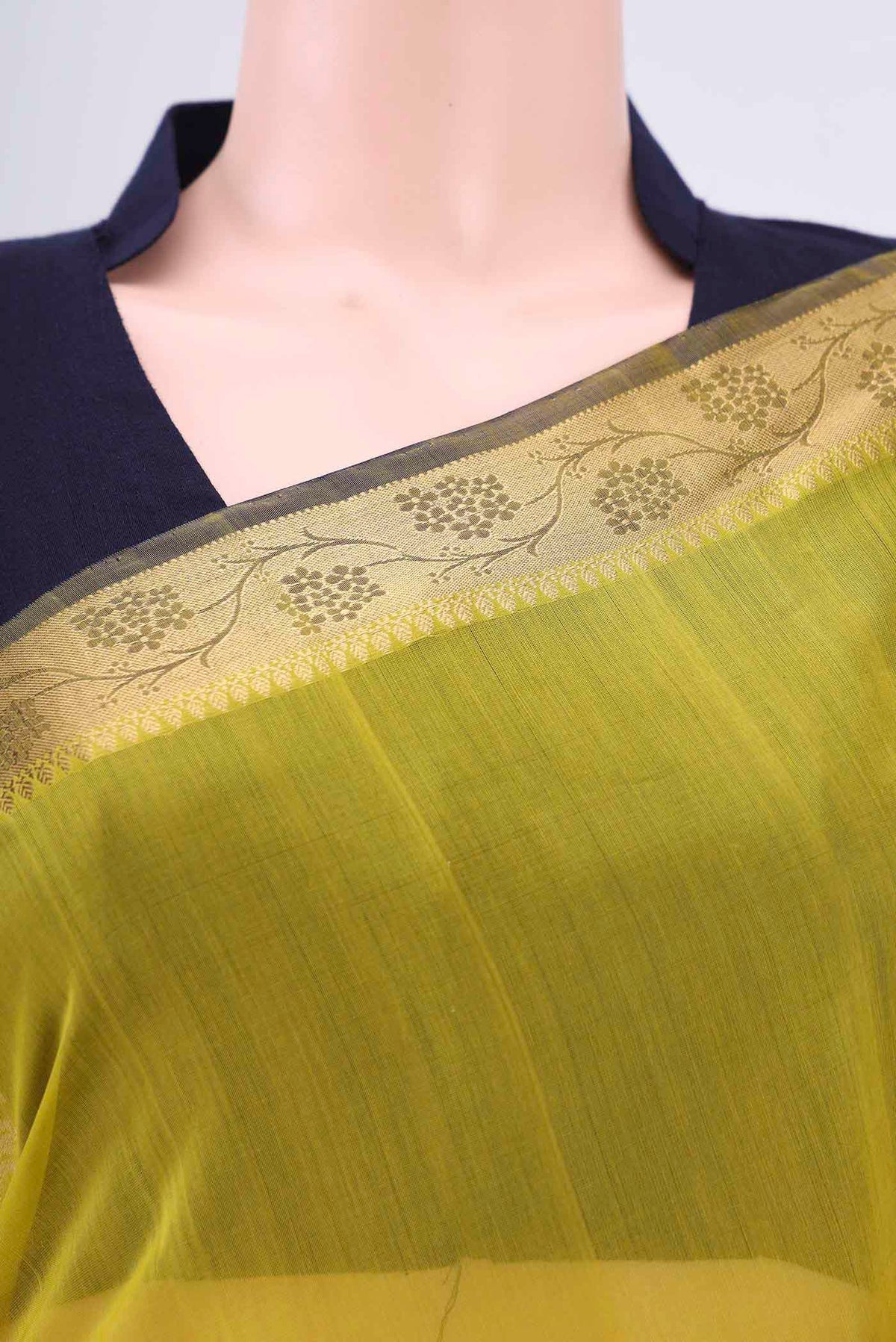 Border image of Acid Green Silk Cotton Saree with Zari Butta on the body and Zari Border. 
