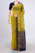 Acid Green Silk Cotton Saree with Zari Butta on the body and Zari Border.  displayed on a mannequin