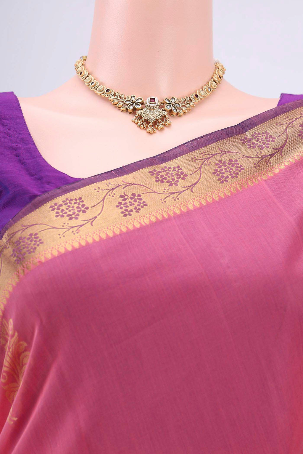 Border image of Pink Silk Cotton Saree with Zari Butta on the body and Zari Border. 