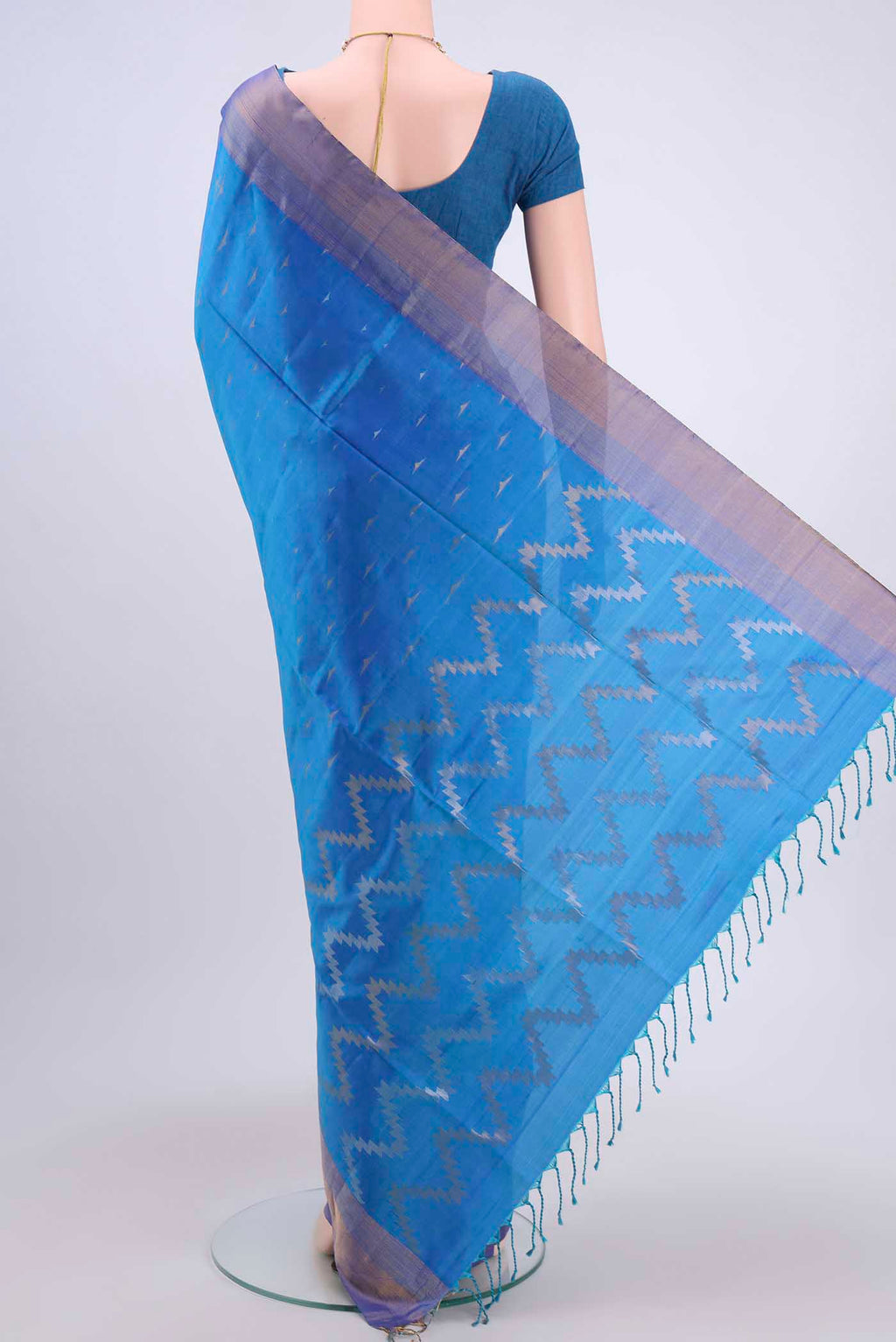Flat view of Blue Dual Tone Soft Silk Saree with Zari Butta on the body and Zari Border