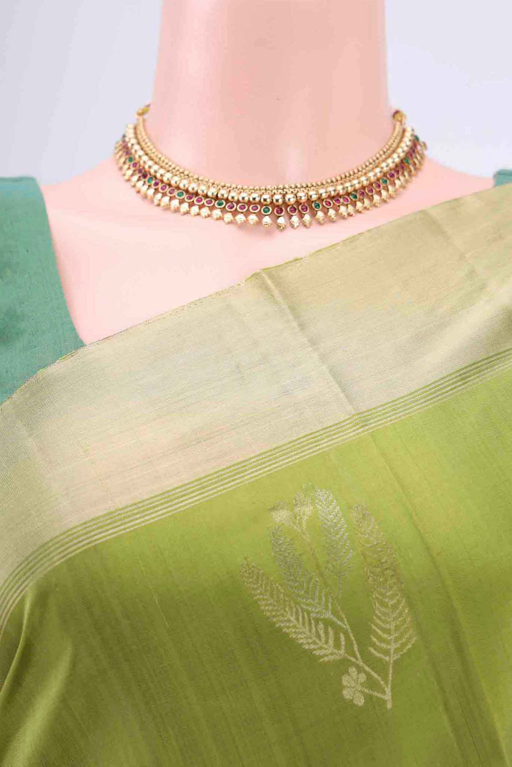 Border image of Light Green Dual Tone Soft Silk Saree with Zari Butta on the body and Zari Border