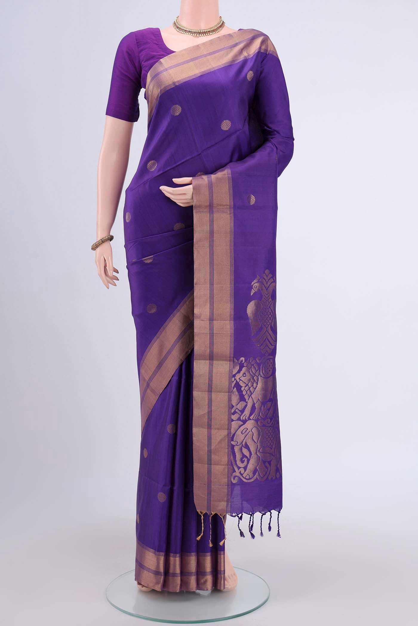 Purple Dual Tone Soft Silk Saree with Zari Butta on the body and Zari Border displayed on a mannequin