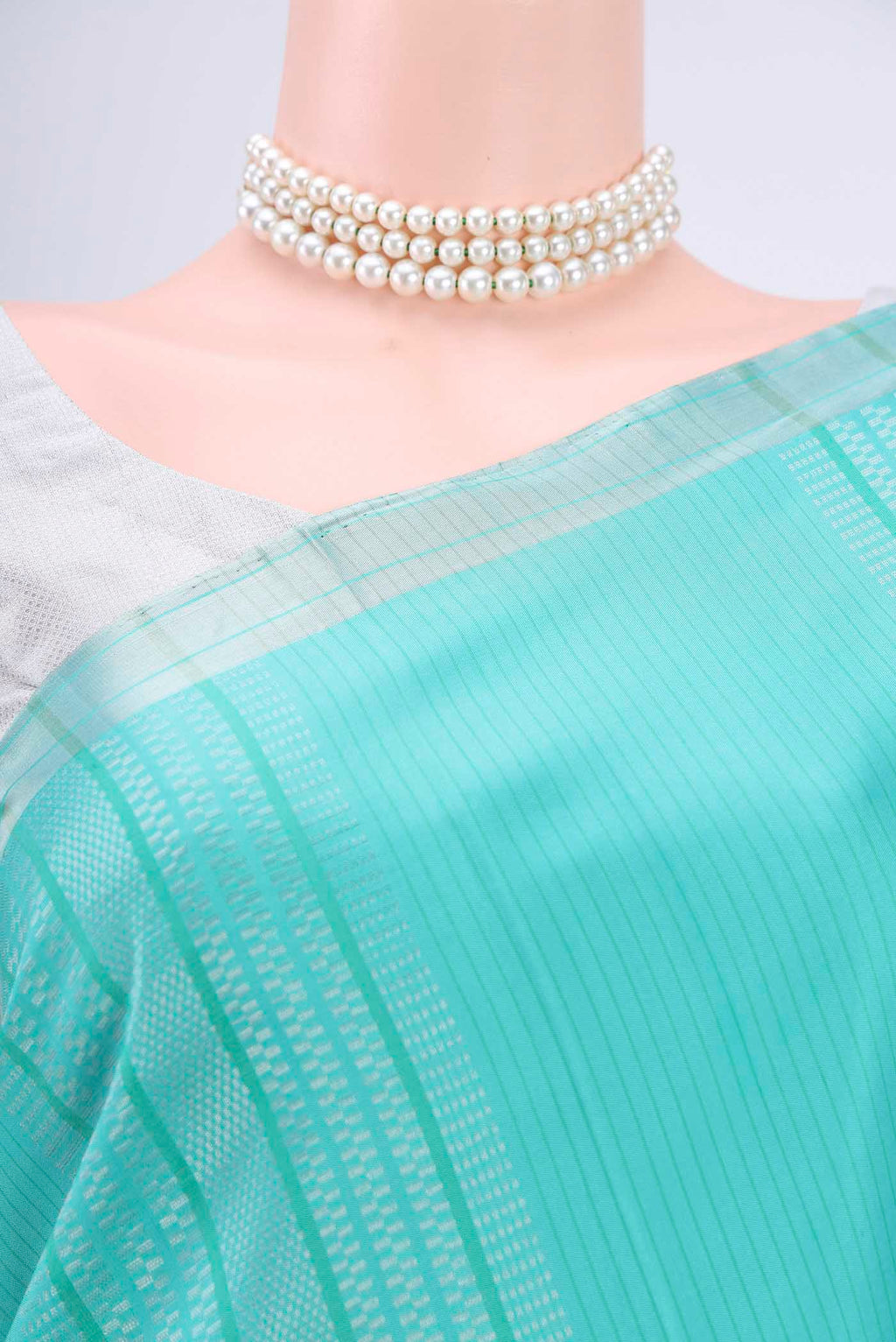 Border image of Sea Green Soft Silk Saree with Stripes on the body and Zari Border. 