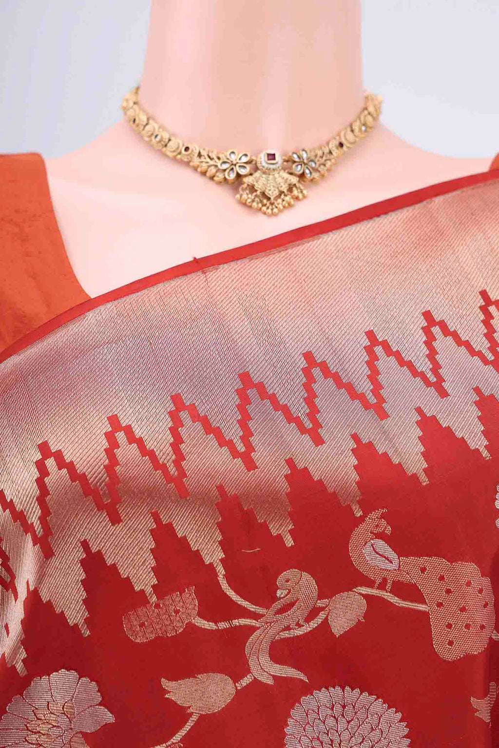 Border image of Rust Soft Silk Saree with Zari Brocade on the body and Zari Border. 