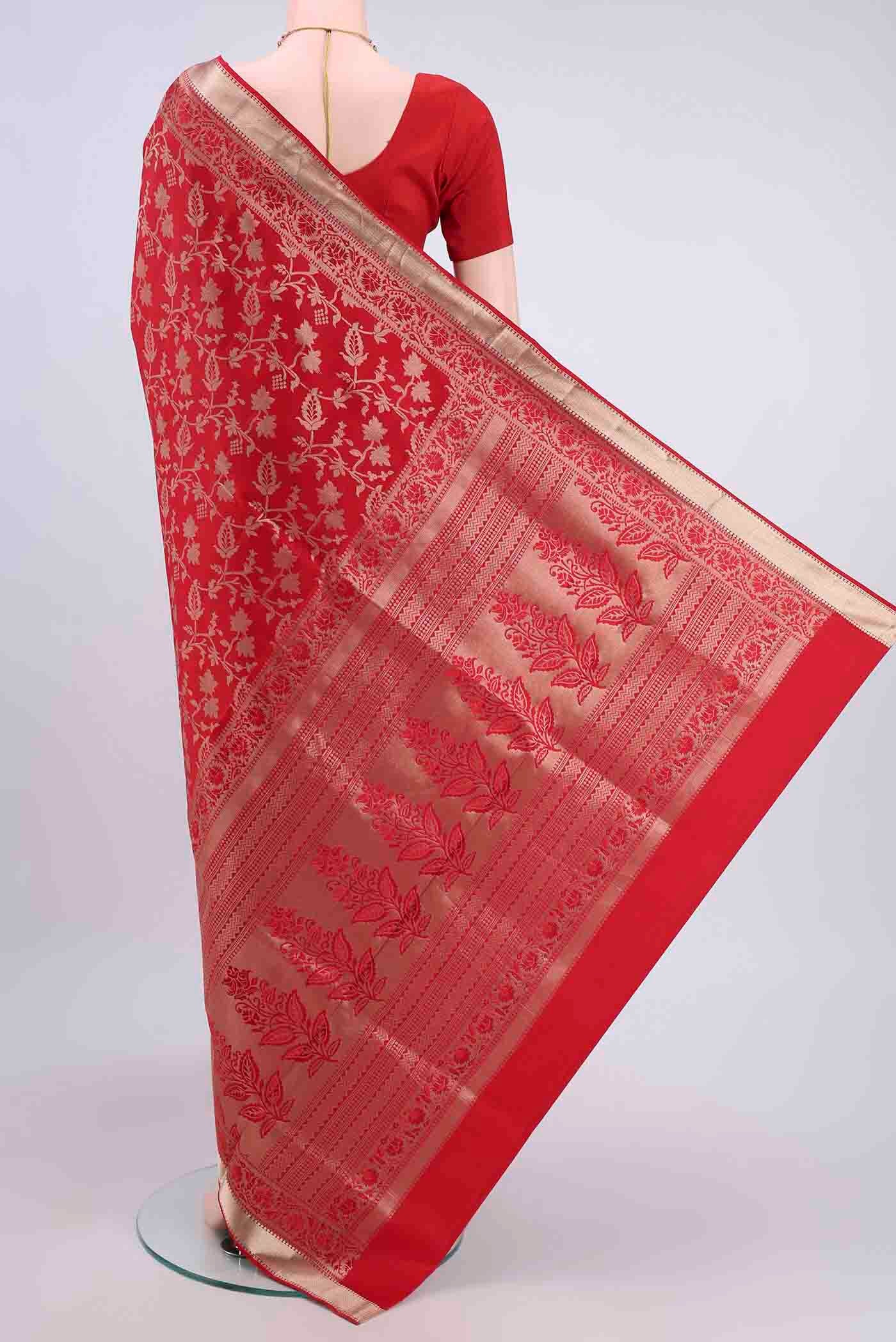 Flat view of Deep Red Soft Silk Saree with Zari Brocade on the body and Zari Border