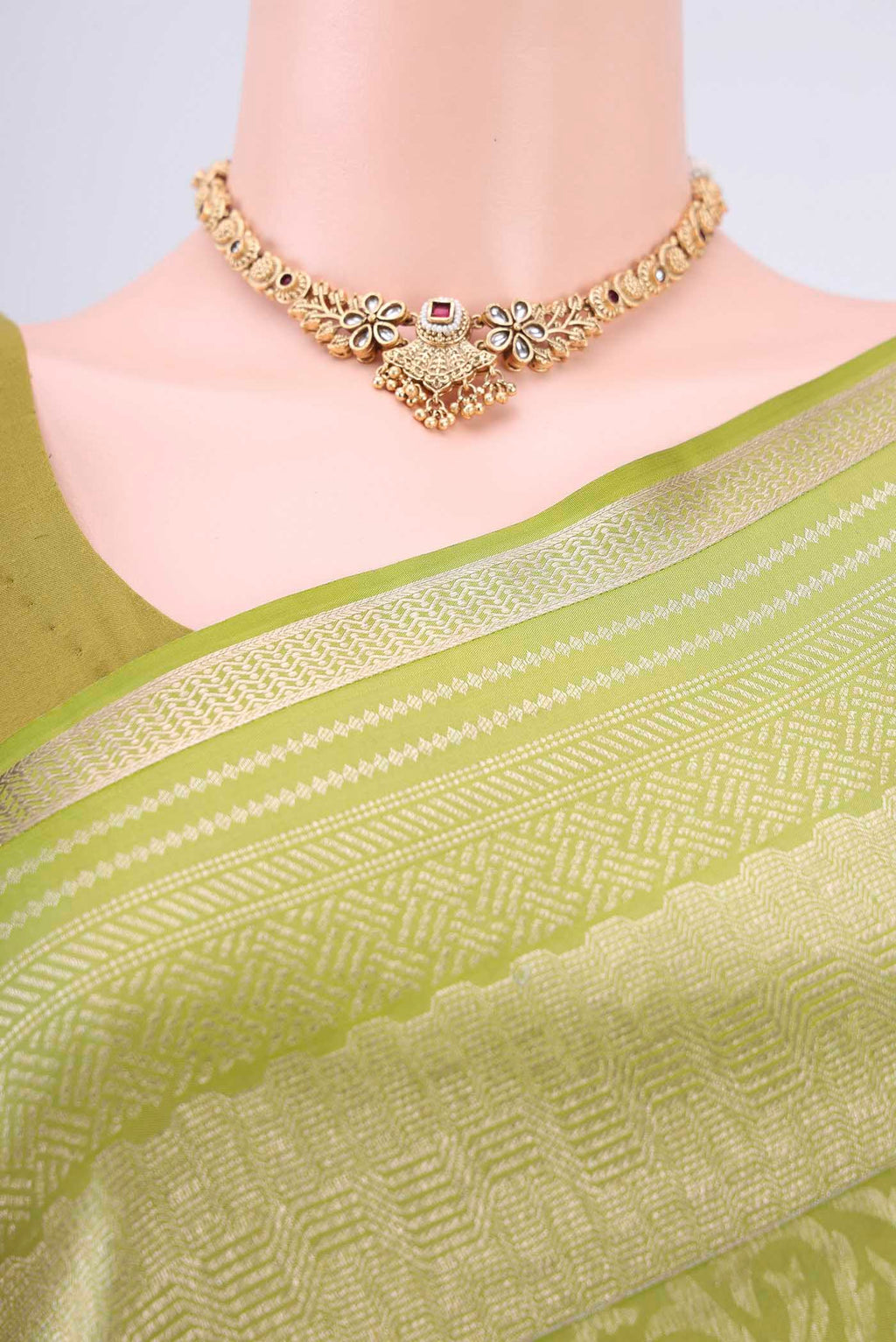 Border image of Light Green Soft Silk Saree with Zari Brocade on the body and Zari Border. 