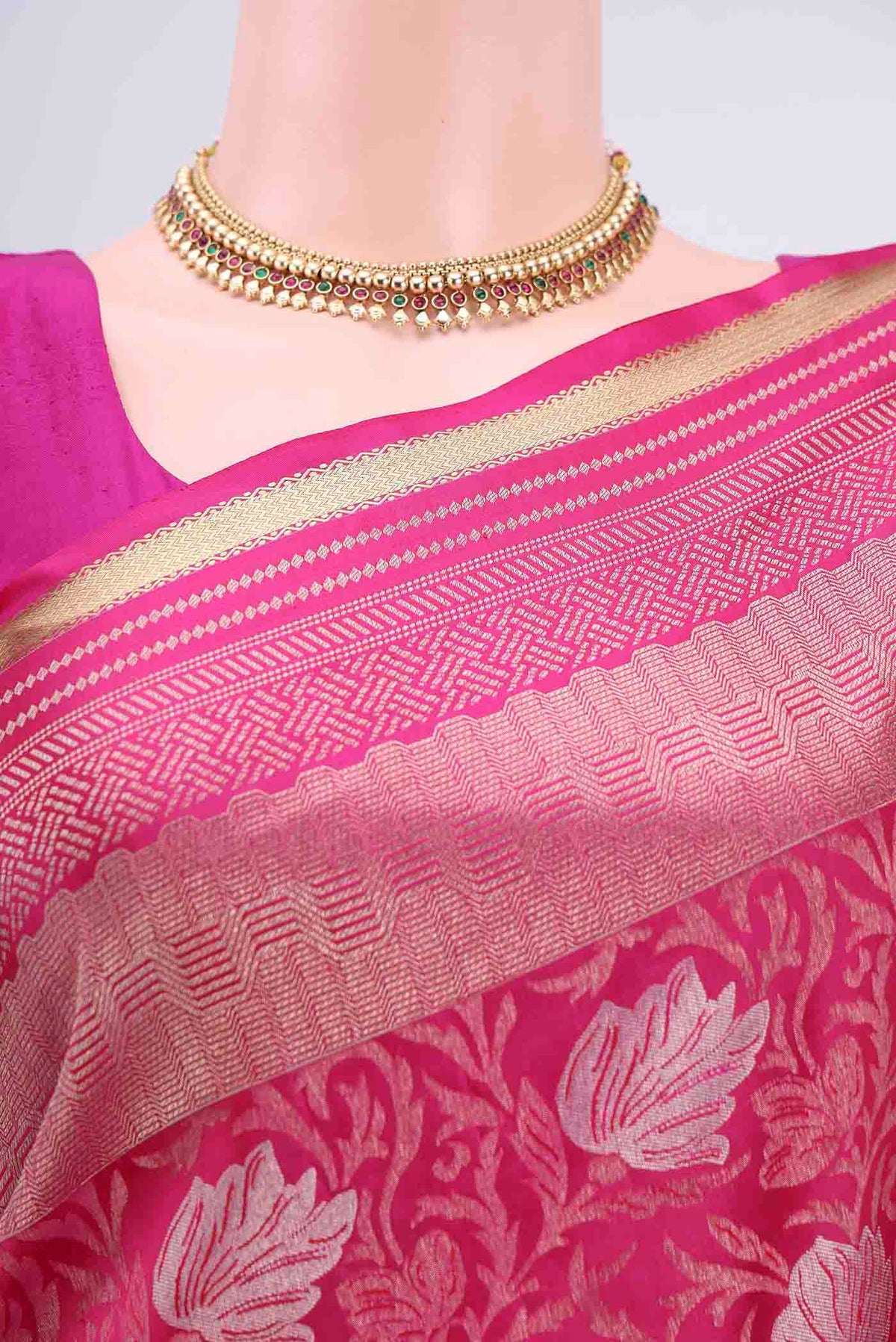 Border image of Rani Pink Soft Silk Saree with Zari Brocade on the body and Zari Border