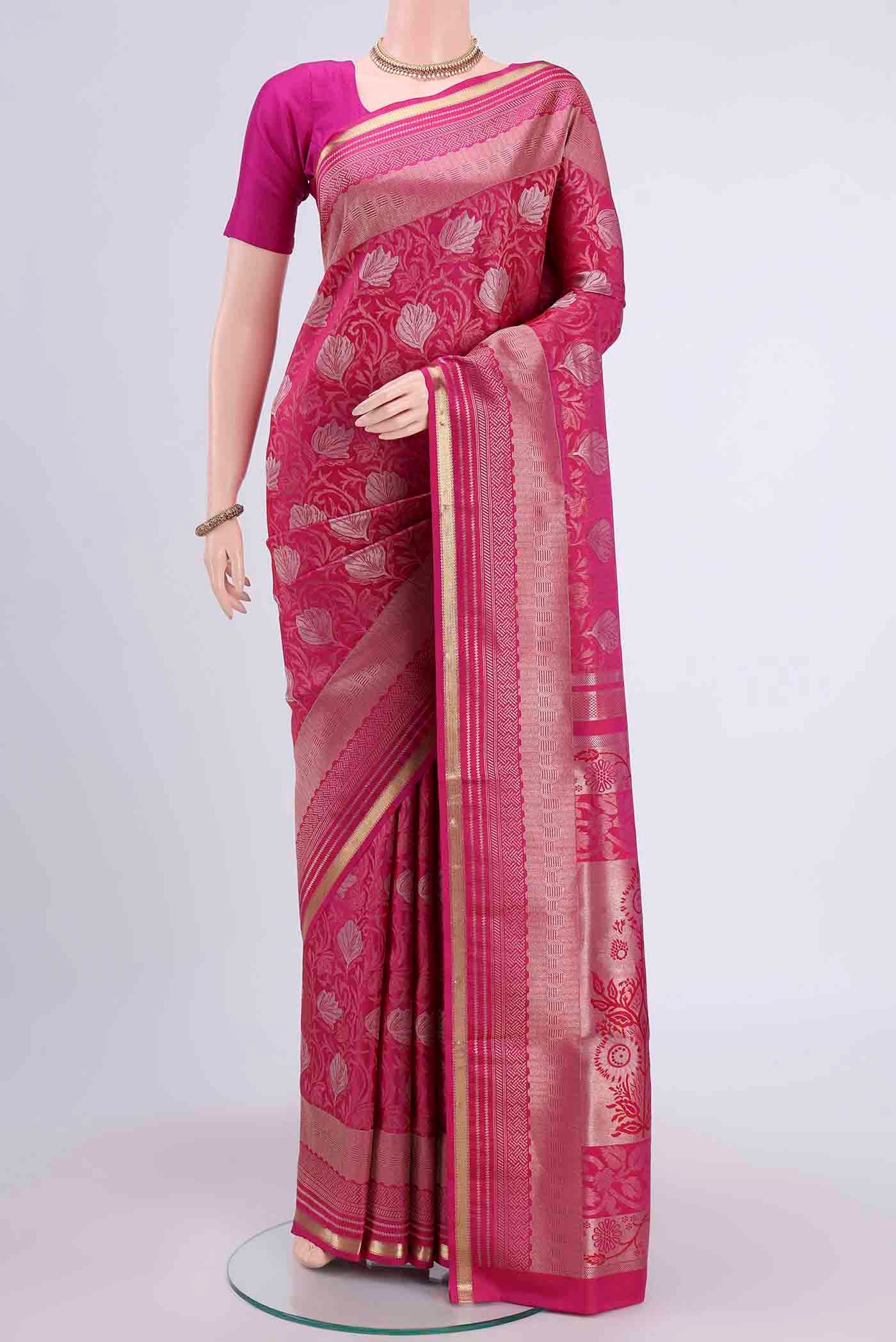 Rani Pink Soft Silk Saree with Zari Brocade on the body and Zari Border displayed on a mannequin