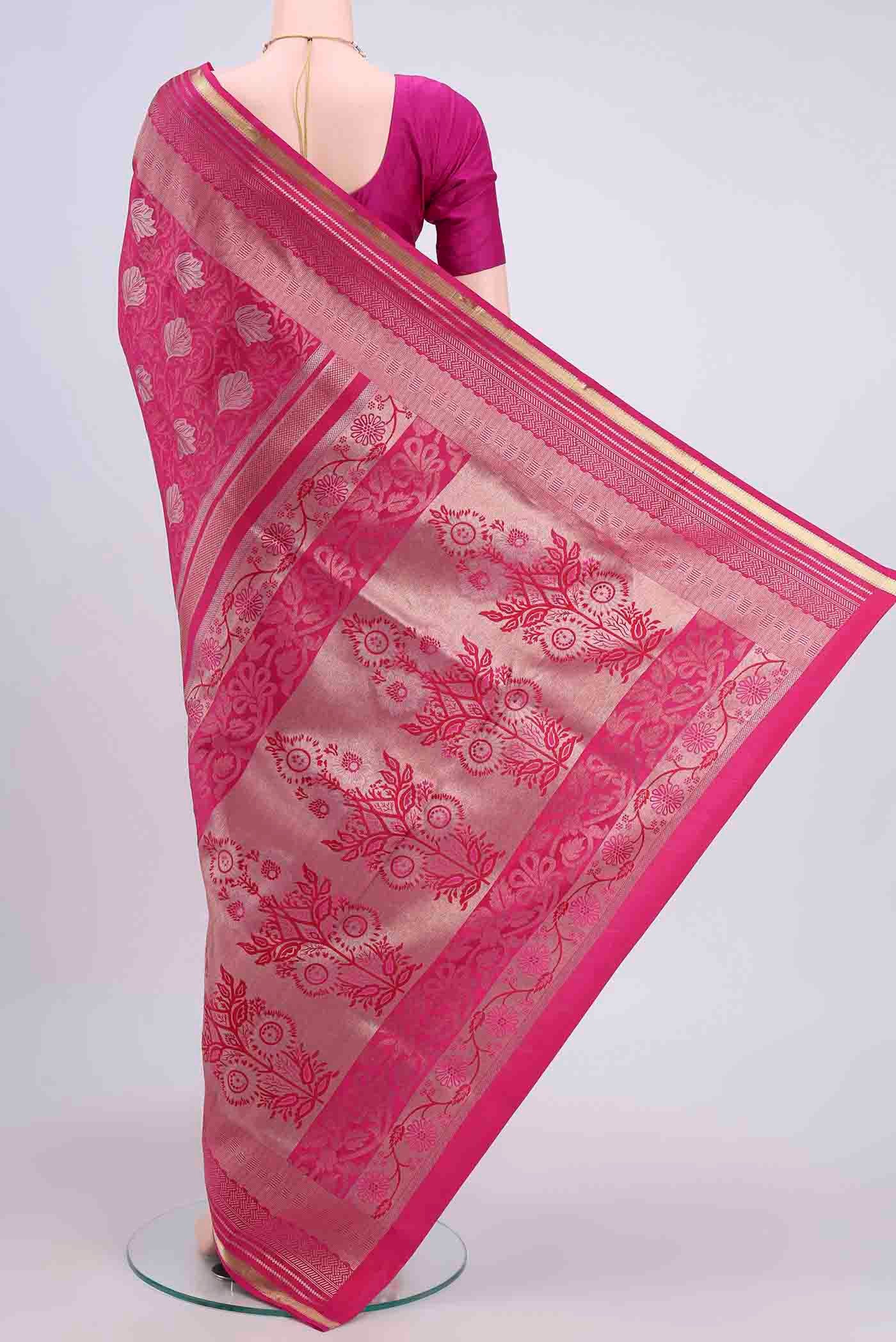 Flat view of Rani Pink Soft Silk Saree with Zari Brocade on the body and Zari Border