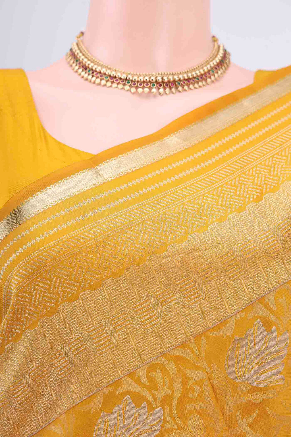 Border image of Yellow Soft Silk Saree with Zari Brocade on the body and Zari Border