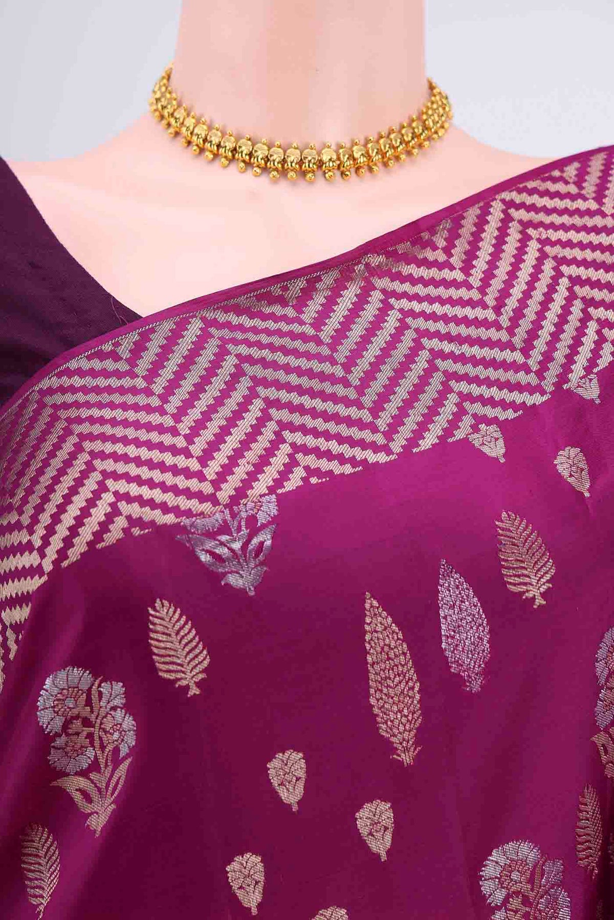 Border image of Magenta Soft Silk Saree with Zari Butta on the body and Fancy Border