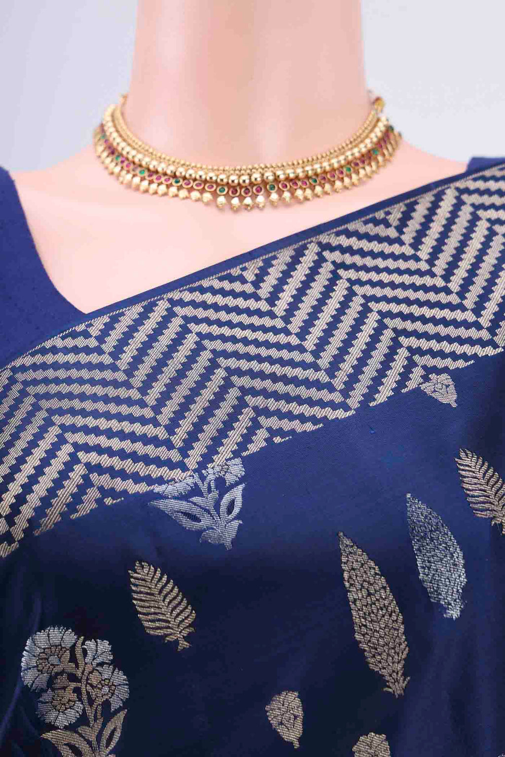 Border image of Navy Blue Soft Silk Saree with Zari Butta on the body and Zari Border