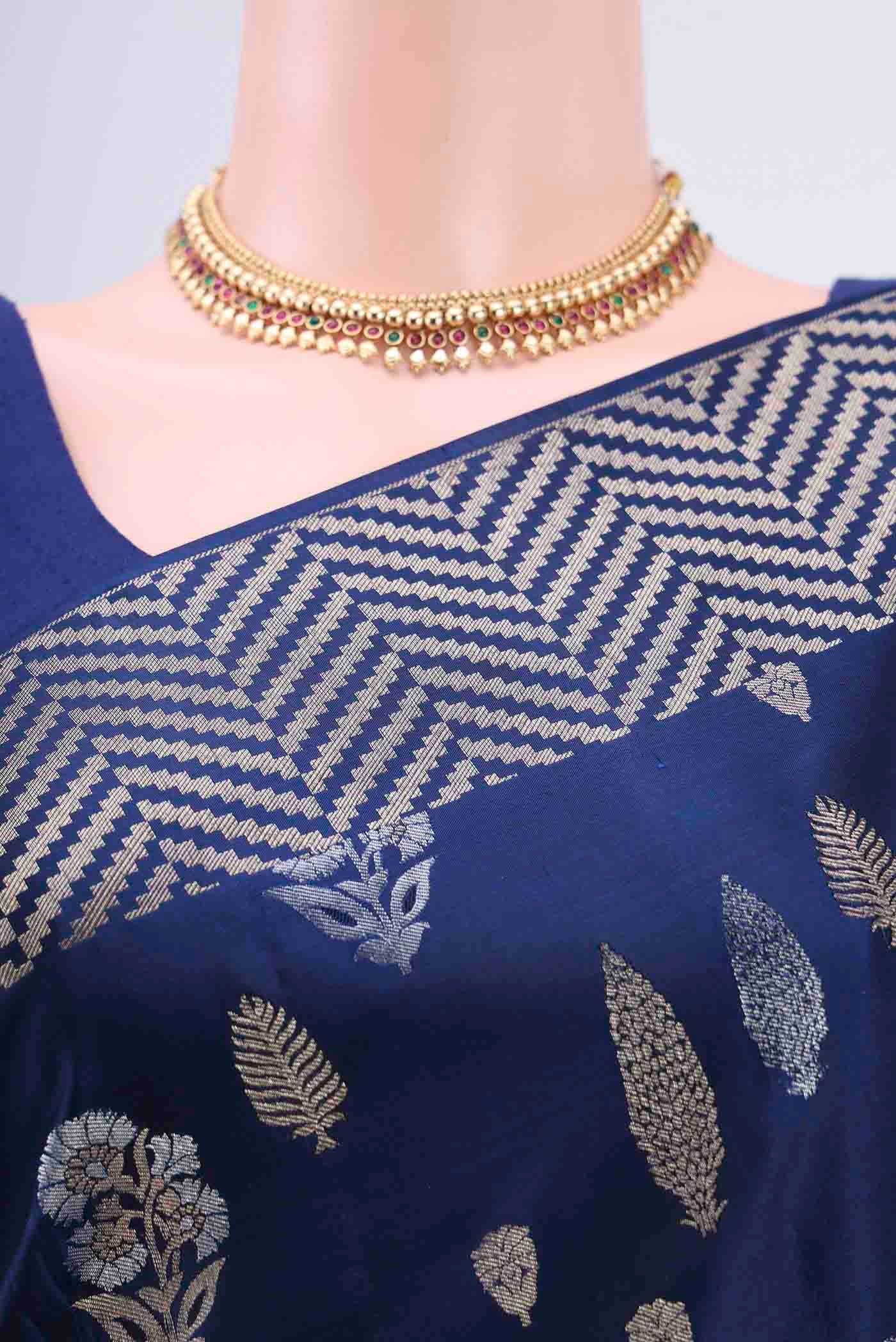 Border image of Navy Blue Soft Silk Saree with Zari Butta on the body and Zari Border