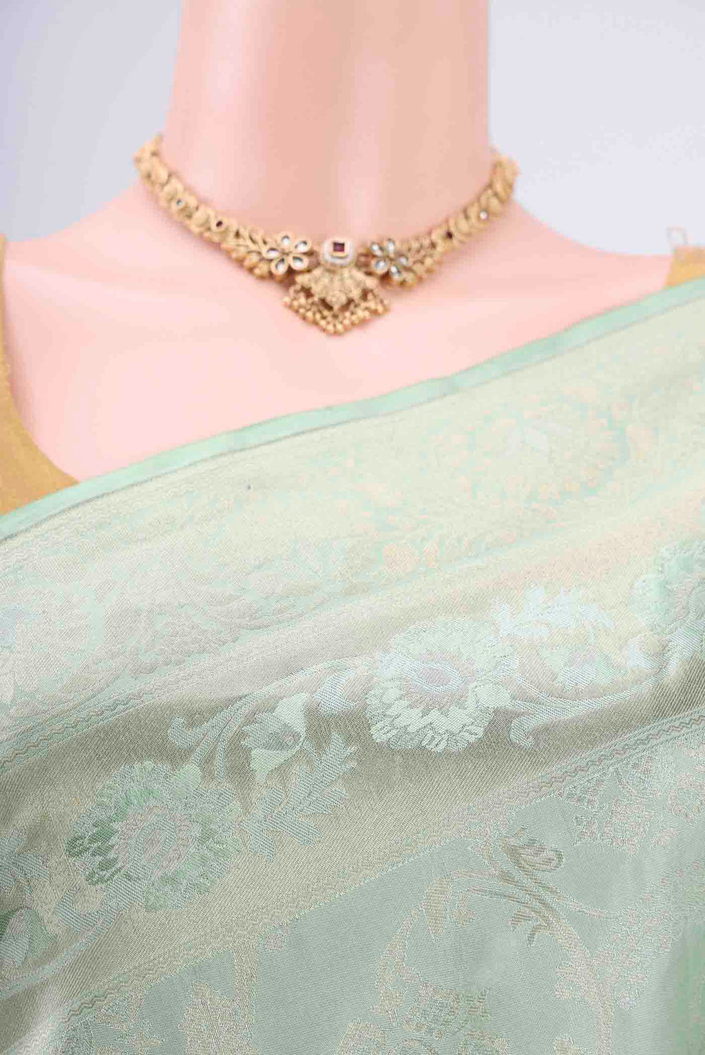 Border image of Mint Green Soft Silk Saree with Zari Brocade on the body and Zari Border. 