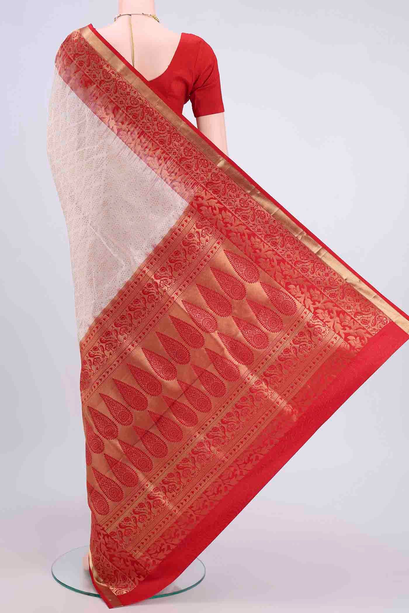 Flat view of Off White Soft Silk Saree with Zari Brocade on the body and Zari Border
