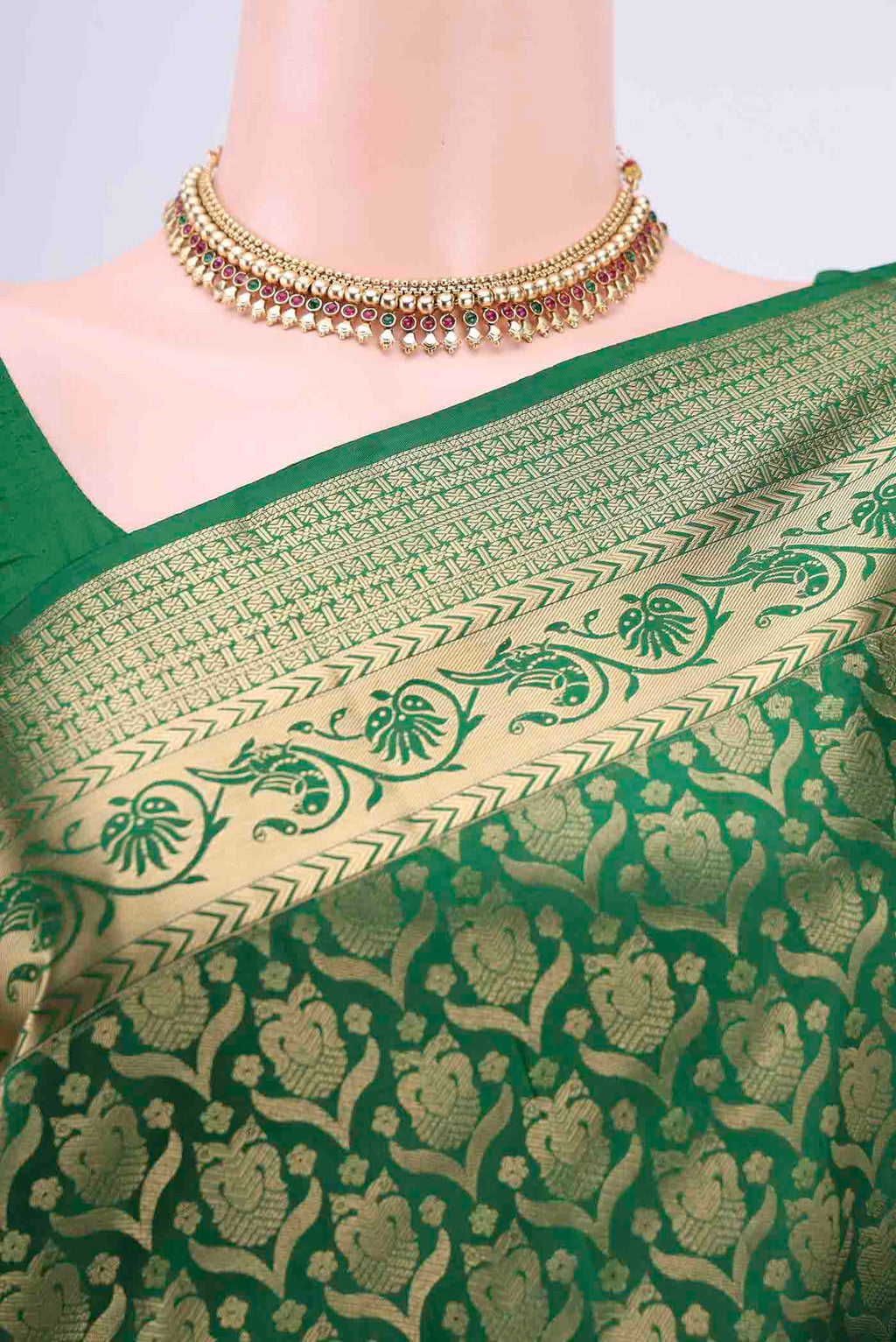 Border image of Bottle Green Soft Silk Saree with Zari Brocade on the body and Zari Border