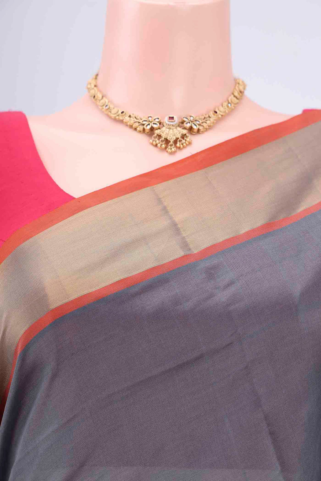 Border image of Grey Blended Poly Cotton Saree with Thread Butta on the body and Zari Border. 