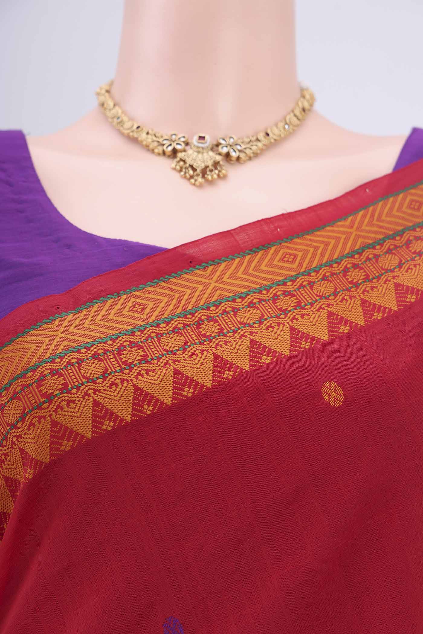 Border image of Red Blended Poly Cotton Saree with Thread Butta on the body and Thread Border. 