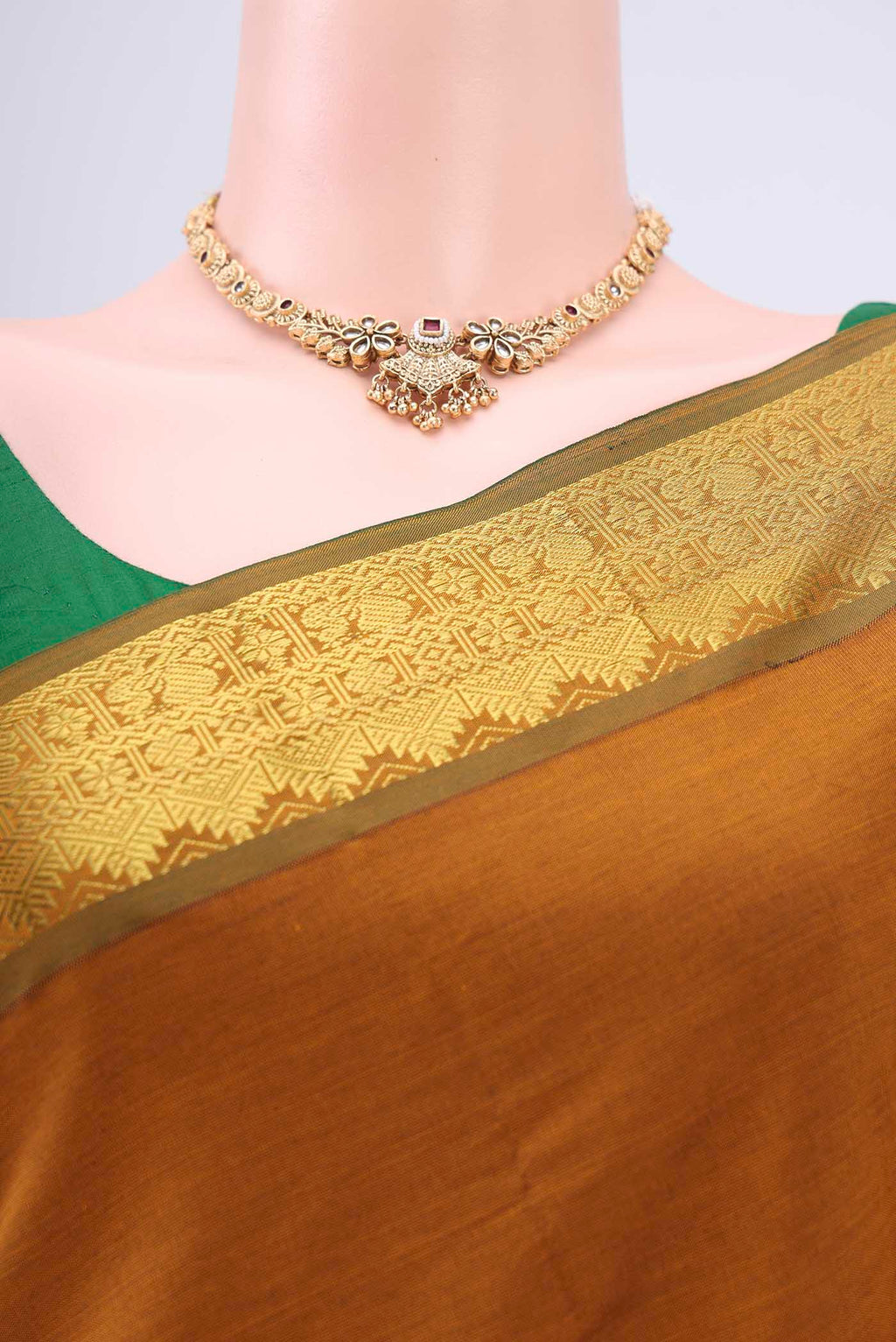 Border image of Mustard Blended Poly Cotton Saree with Plain Body and Zari Border. 