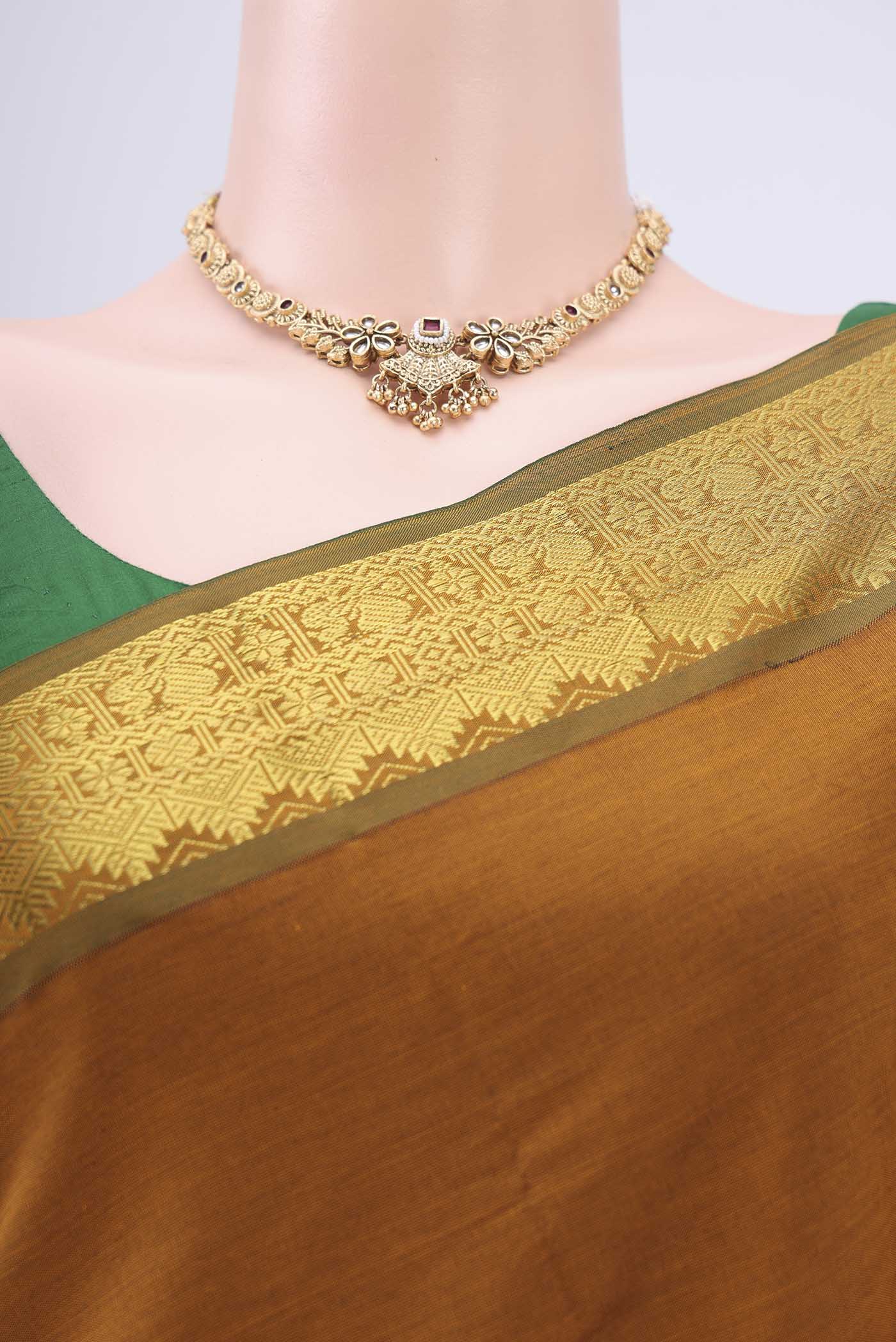 Border image of Mustard Blended Poly Cotton Saree with Plain Body and Zari Border. 