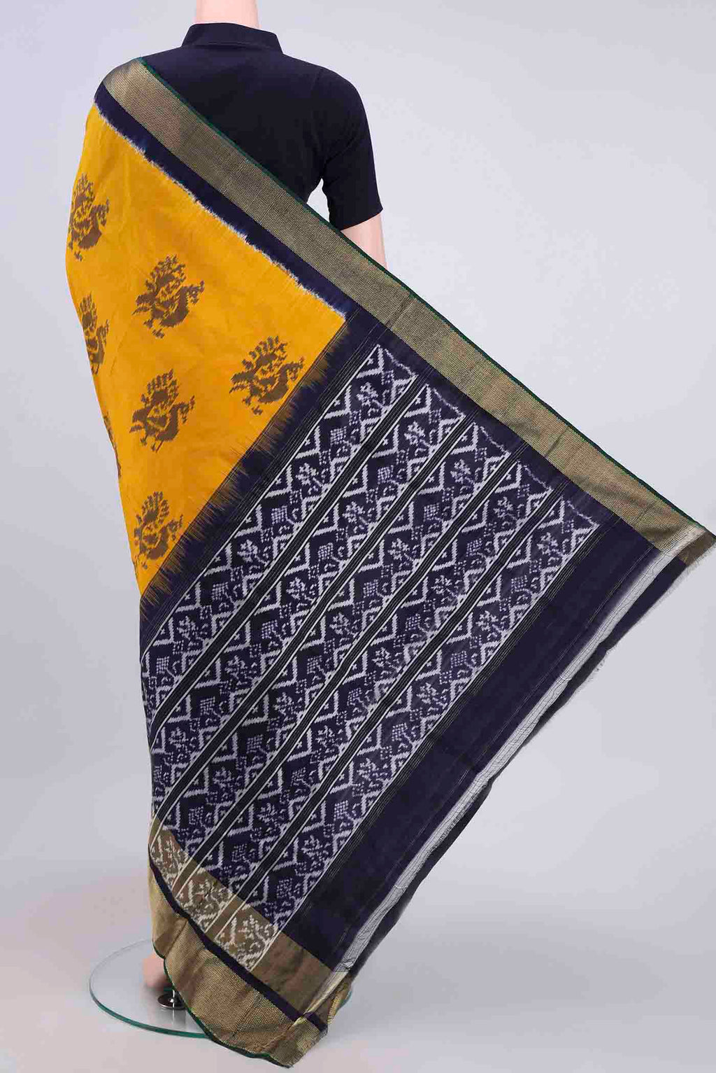 Flat view of Yellow Pochampally Silk Saree with Pure Ikat on the body and Zari Border