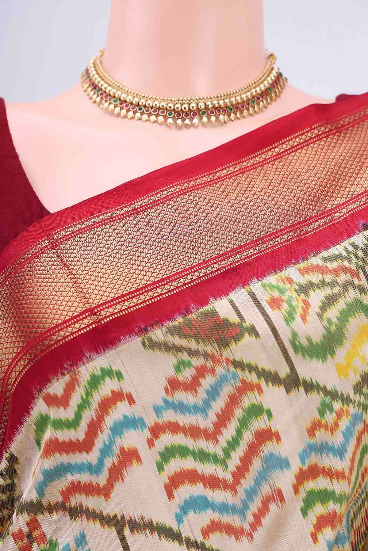 Border image of Cream Pochampally Silk Saree with Pure Ikat on the body and Zari Border