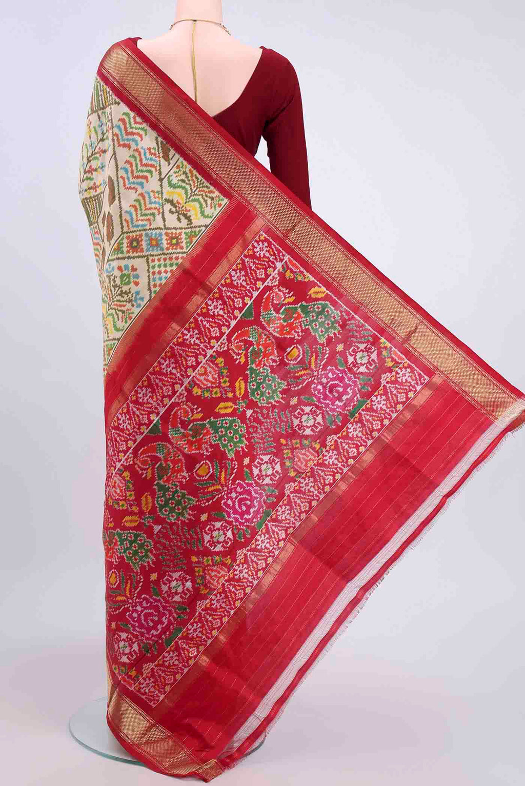 Flat view of Cream Pochampally Silk Saree with Pure Ikat on the body and Zari Border