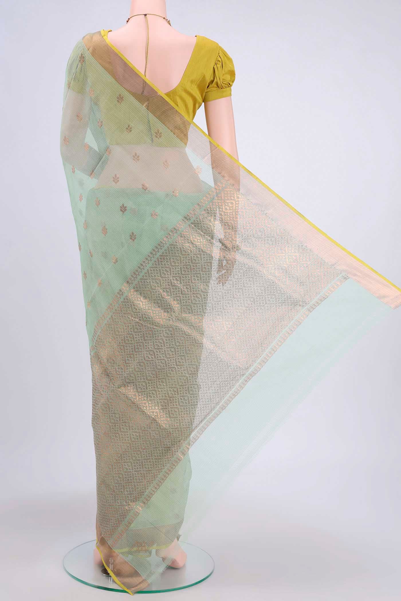 Flat view of Pure Silk Pure Zari Mint Green Kota Saree with Zari Butta on the body and Zari Border