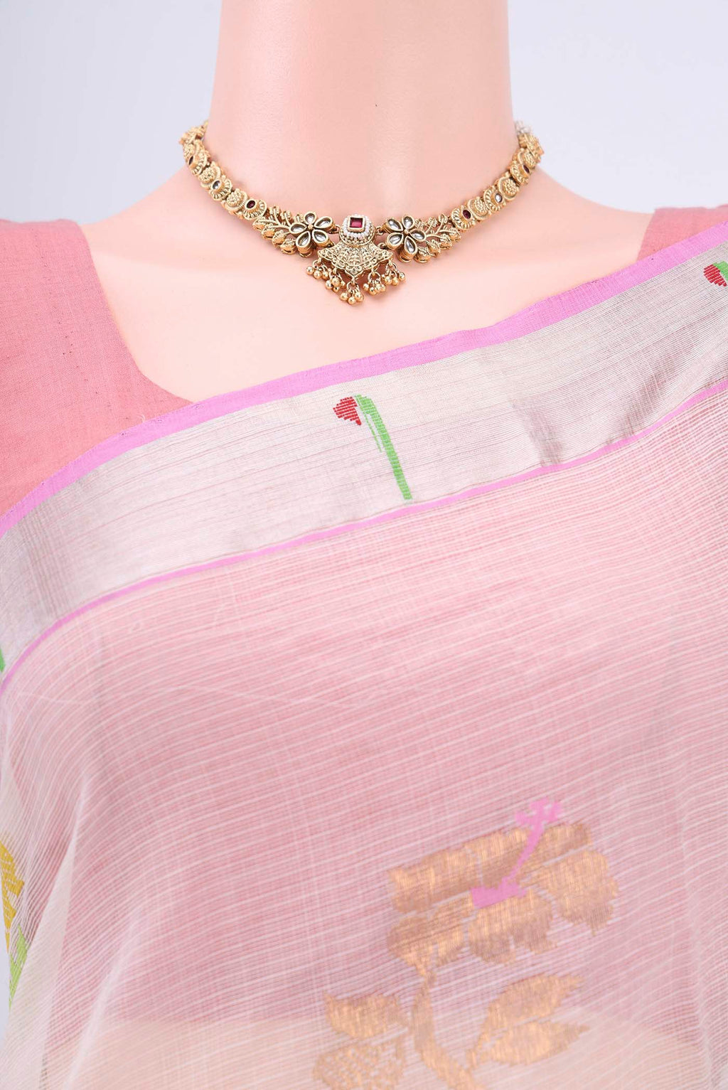 Border image of Pure Silk Pure Zari Peach Kota Cotton Saree with Zari And Thread Butta on the body and Zari Border. 