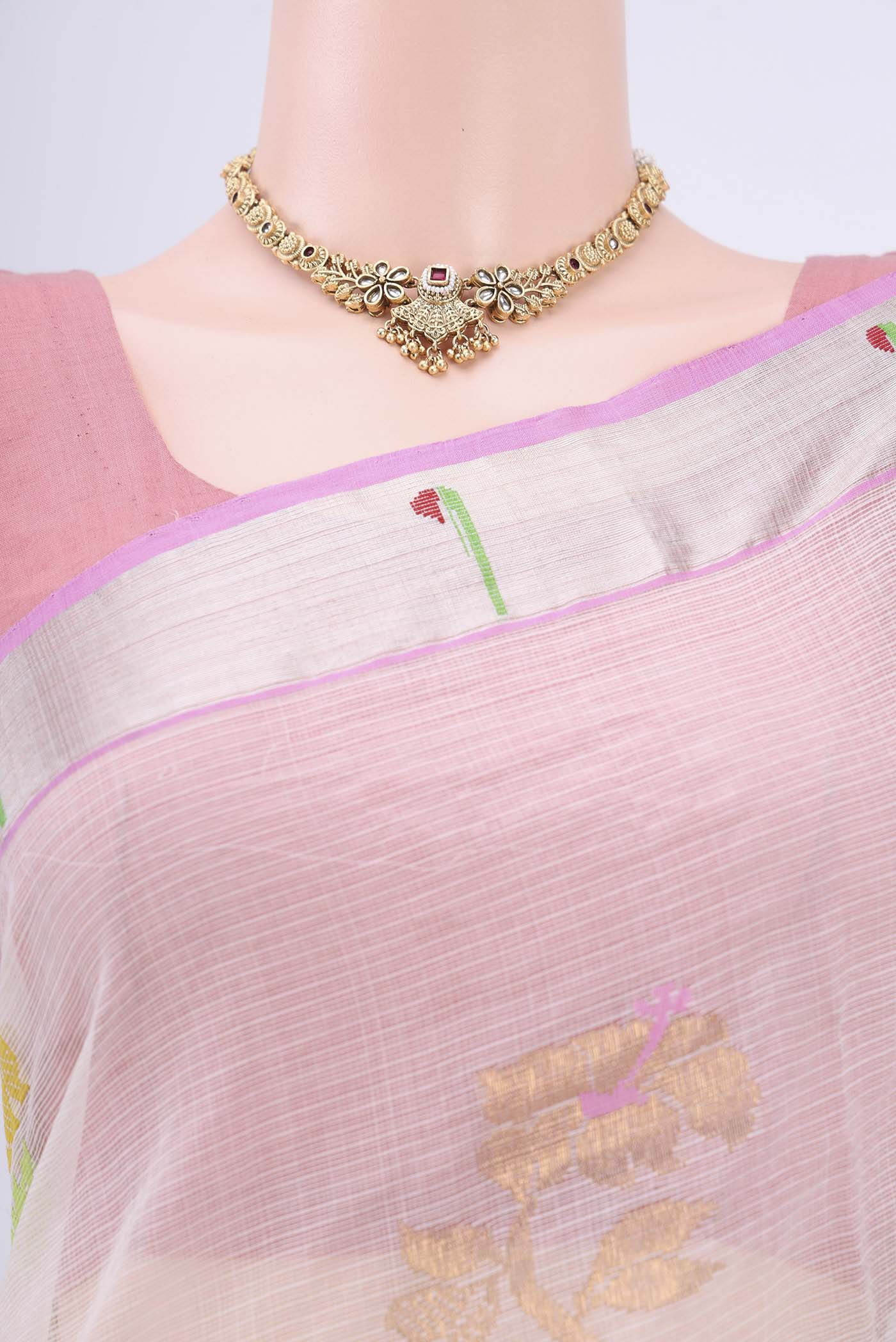 Border image of Pure Silk Pure Zari Peach Kota Cotton Saree with Zari And Thread Butta on the body and Zari Border. 