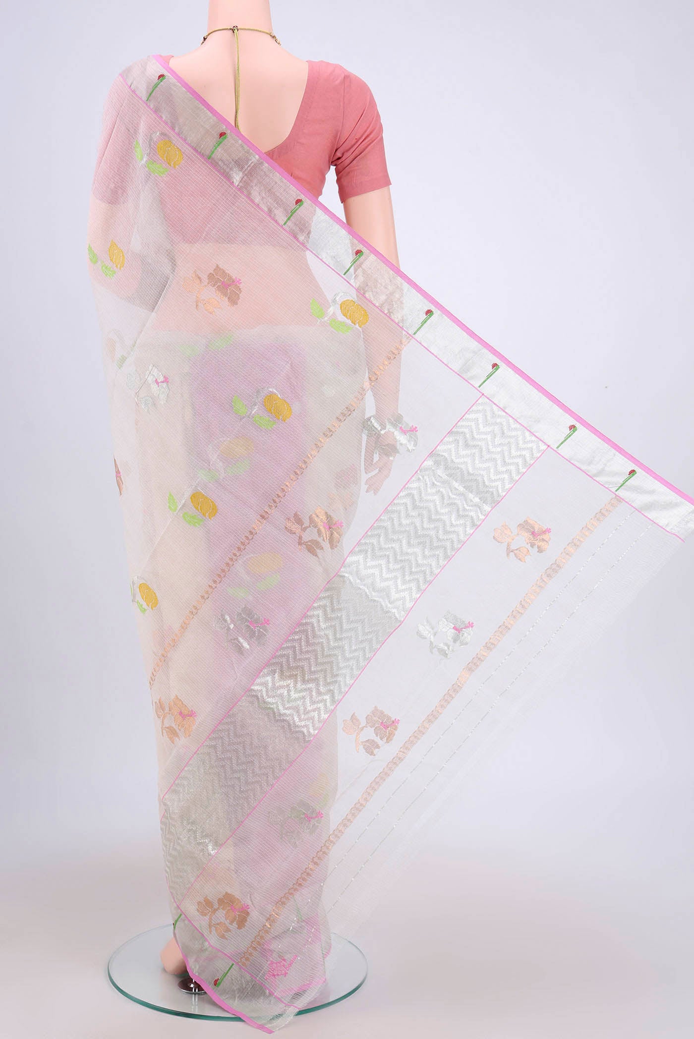 Flat view of Pure Silk Pure Zari Peach Kota Cotton Saree with Zari And Thread Butta on the body and Zari Border. 
