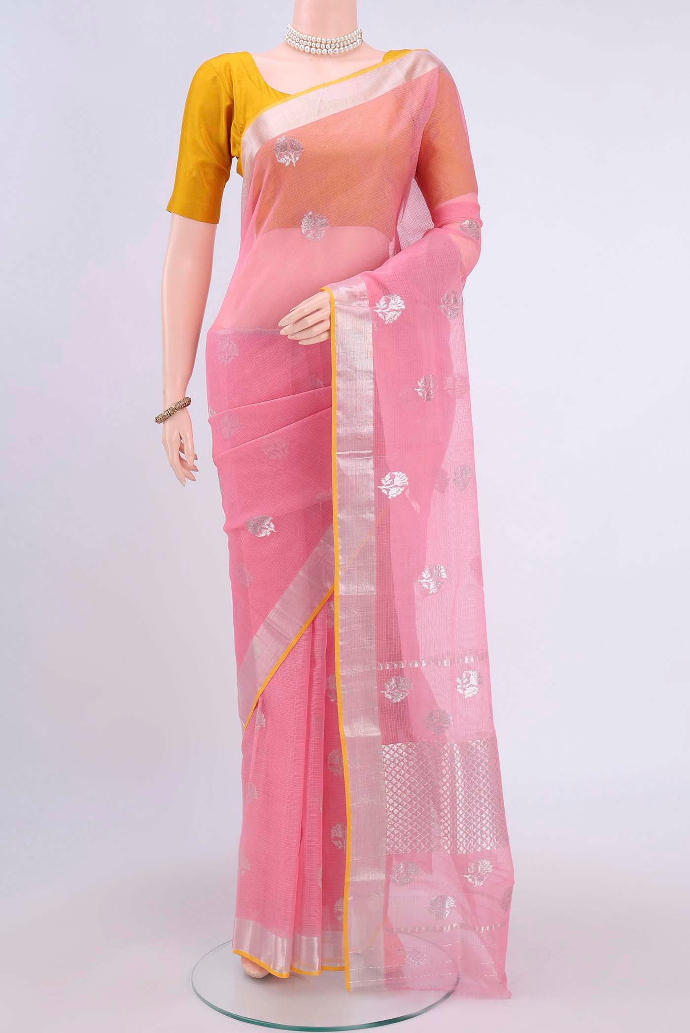 Pure Silk Pure Zari Rose pink Kota Saree with Zari And Thread Butta on the body and Zari Border displayed on a mannequin