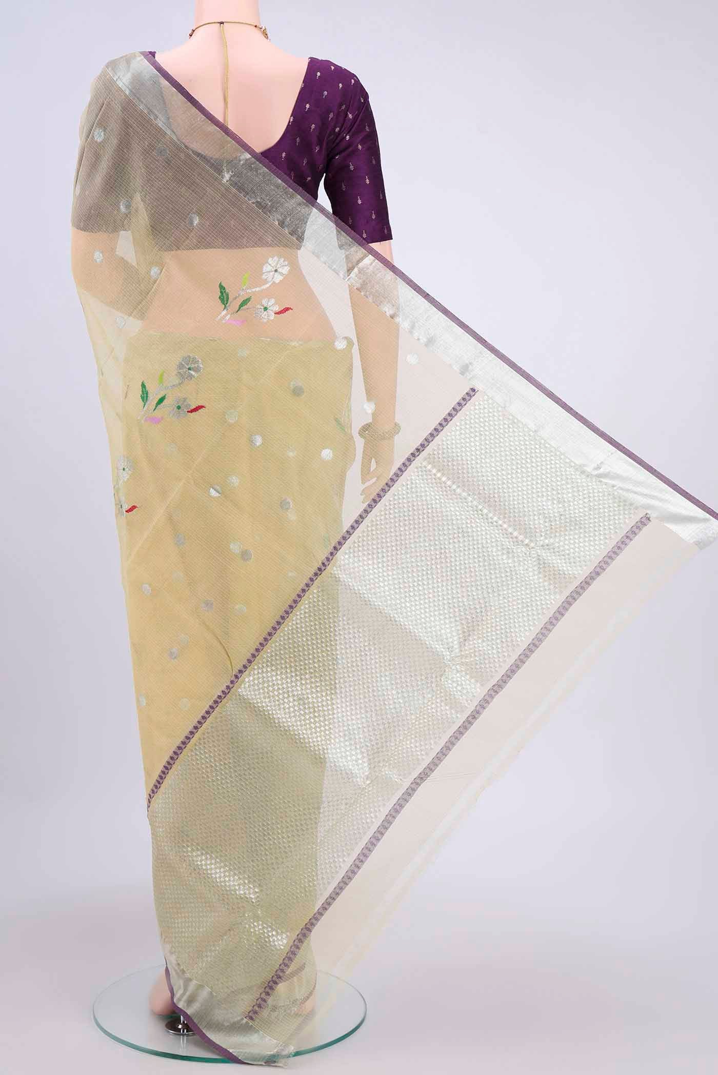 Flat view of Pure Silk Pure Zari Lemon Yellow Kota Saree with Zari Butta on the body and Zari Border