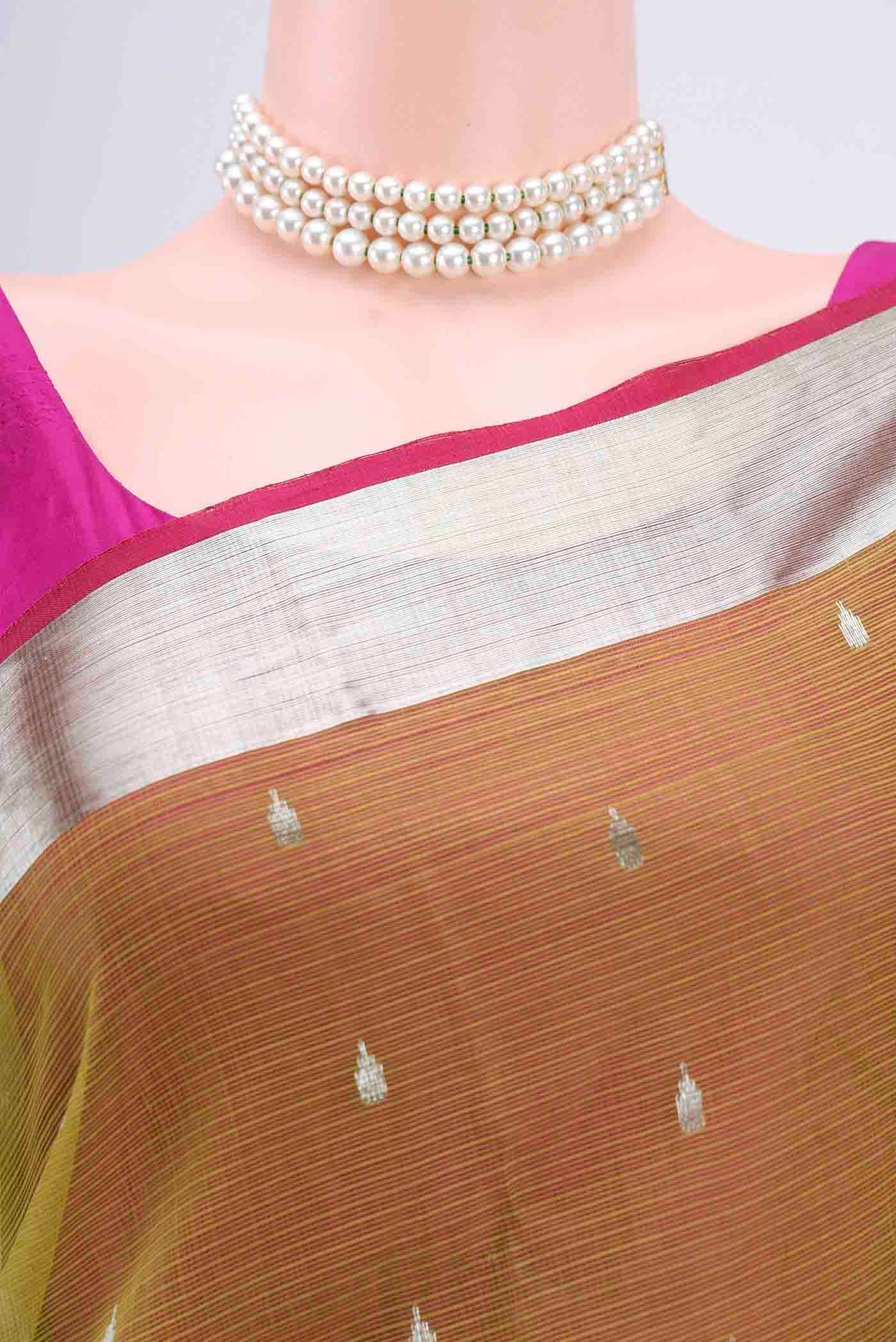 Border image of Pure Silk Pure Zari Mehandi Green Kota Saree with Zari And Thread Butta on the body and Zari Border