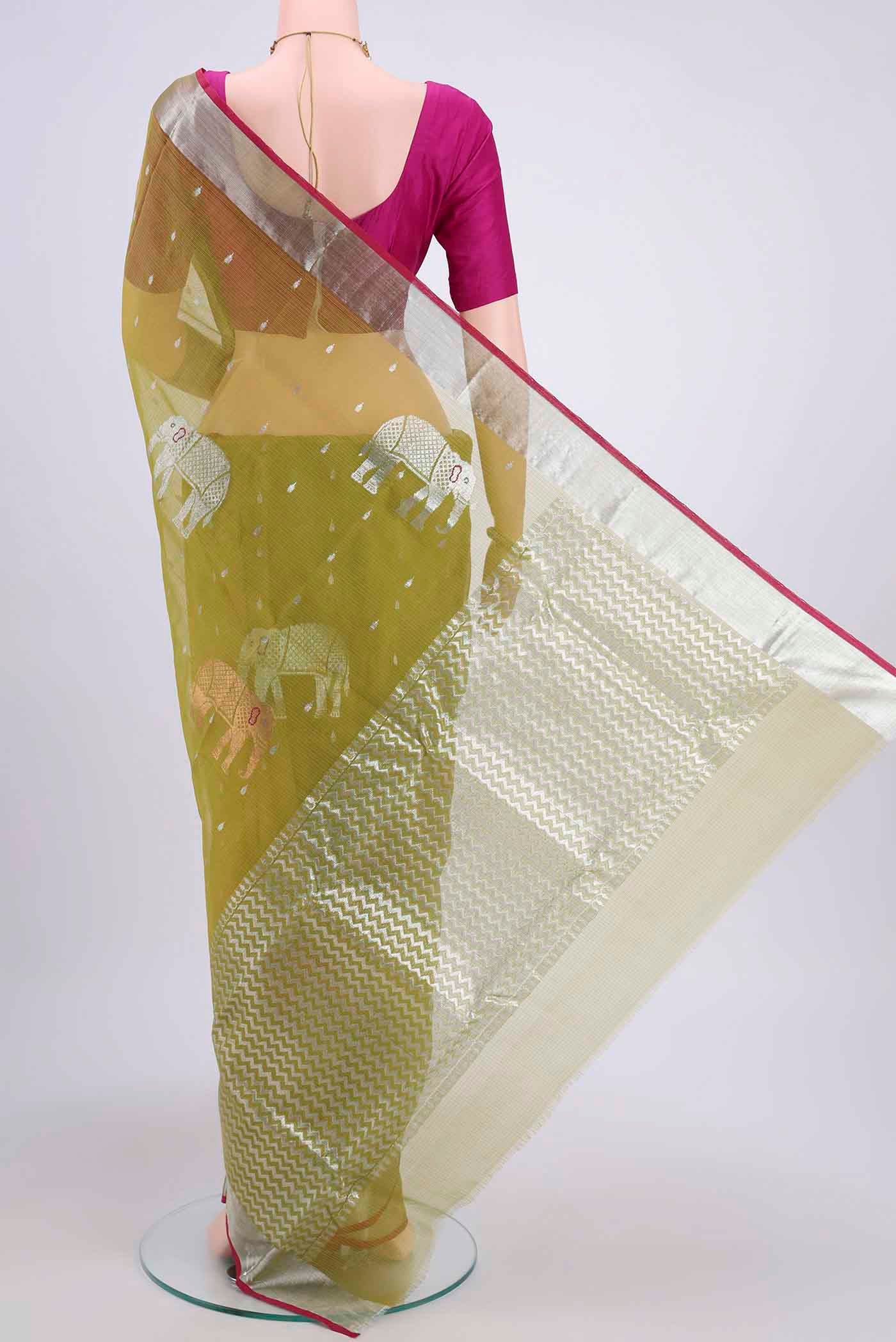 Flat view of Pure Silk Pure Zari Mehandi Green Kota Saree with Zari And Thread Butta on the body and Zari Border