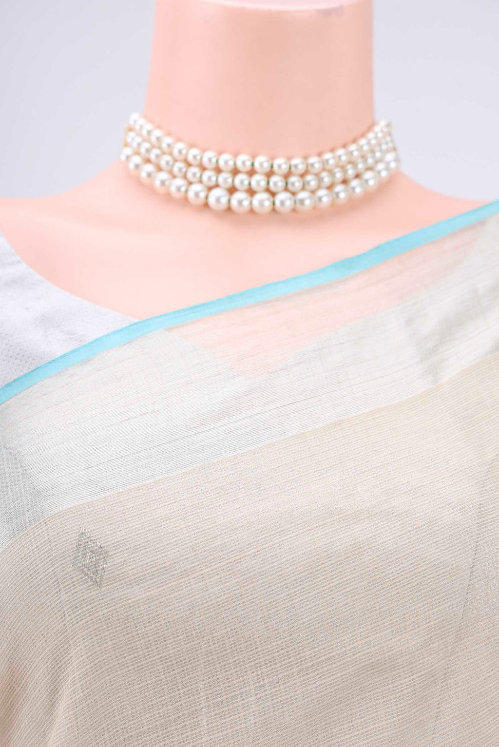 Border image of Pure Silk Pure Zari Cream Kota Saree with Zari Butta on the body and Zari Border. 